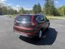 2015 Red /Black Honda CR-V EX-L 4WD (2HKRM4H73FH) with an 2.4L I4 DOHC 16V engine, Automatic transmission, located at 11115 Chardon Rd. , Chardon, OH, 44024, (440) 214-9705, 41.580246, -81.241943 - This One Owner 2015 Honda CR-V EX-L AWD has luxury, reliability and, fuel efficiency. Powered by Honda's incredible 2.4 I4 Engine and CVT (Continuously Variable Transmission) it achieves up to 32 MPG Highway while still have all weather capability due to it's all wheel drive system. With a leather i - Photo#6