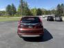 2015 Red /Black Honda CR-V EX-L 4WD (2HKRM4H73FH) with an 2.4L I4 DOHC 16V engine, Automatic transmission, located at 11115 Chardon Rd. , Chardon, OH, 44024, (440) 214-9705, 41.580246, -81.241943 - This One Owner 2015 Honda CR-V EX-L AWD has luxury, reliability and, fuel efficiency. Powered by Honda's incredible 2.4 I4 Engine and CVT (Continuously Variable Transmission) it achieves up to 32 MPG Highway while still have all weather capability due to it's all wheel drive system. With a leather i - Photo#7