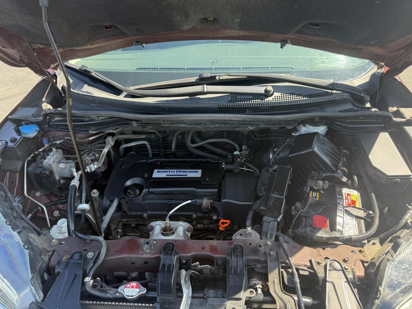 2015 Red /Black Honda CR-V EX-L 4WD (2HKRM4H73FH) with an 2.4L I4 DOHC 16V engine, Automatic transmission, located at 11115 Chardon Rd. , Chardon, OH, 44024, (440) 214-9705, 41.580246, -81.241943 - This One Owner 2015 Honda CR-V EX-L AWD has luxury, reliability and, fuel efficiency. Powered by Honda's incredible 2.4 I4 Engine and CVT (Continuously Variable Transmission) it achieves up to 32 MPG Highway while still have all weather capability due to it's all wheel drive system. With a leather i - Photo#13