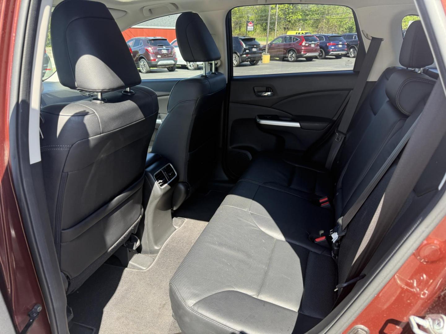 2015 Red /Black Honda CR-V EX-L 4WD (2HKRM4H73FH) with an 2.4L I4 DOHC 16V engine, Automatic transmission, located at 11115 Chardon Rd. , Chardon, OH, 44024, (440) 214-9705, 41.580246, -81.241943 - This One Owner 2015 Honda CR-V EX-L AWD has luxury, reliability and, fuel efficiency. Powered by Honda's incredible 2.4 I4 Engine and CVT (Continuously Variable Transmission) it achieves up to 32 MPG Highway while still have all weather capability due to it's all wheel drive system. With a leather i - Photo#35