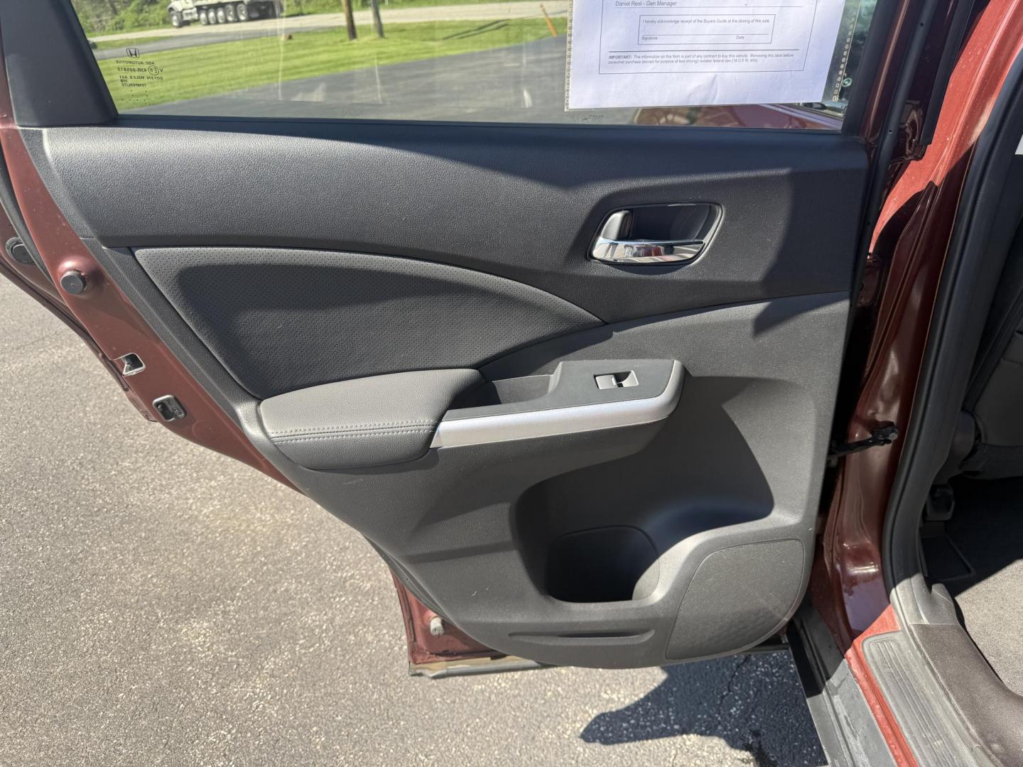 2015 Red /Black Honda CR-V EX-L 4WD (2HKRM4H73FH) with an 2.4L I4 DOHC 16V engine, Automatic transmission, located at 11115 Chardon Rd. , Chardon, OH, 44024, (440) 214-9705, 41.580246, -81.241943 - This One Owner 2015 Honda CR-V EX-L AWD has luxury, reliability and, fuel efficiency. Powered by Honda's incredible 2.4 I4 Engine and CVT (Continuously Variable Transmission) it achieves up to 32 MPG Highway while still have all weather capability due to it's all wheel drive system. With a leather i - Photo#36