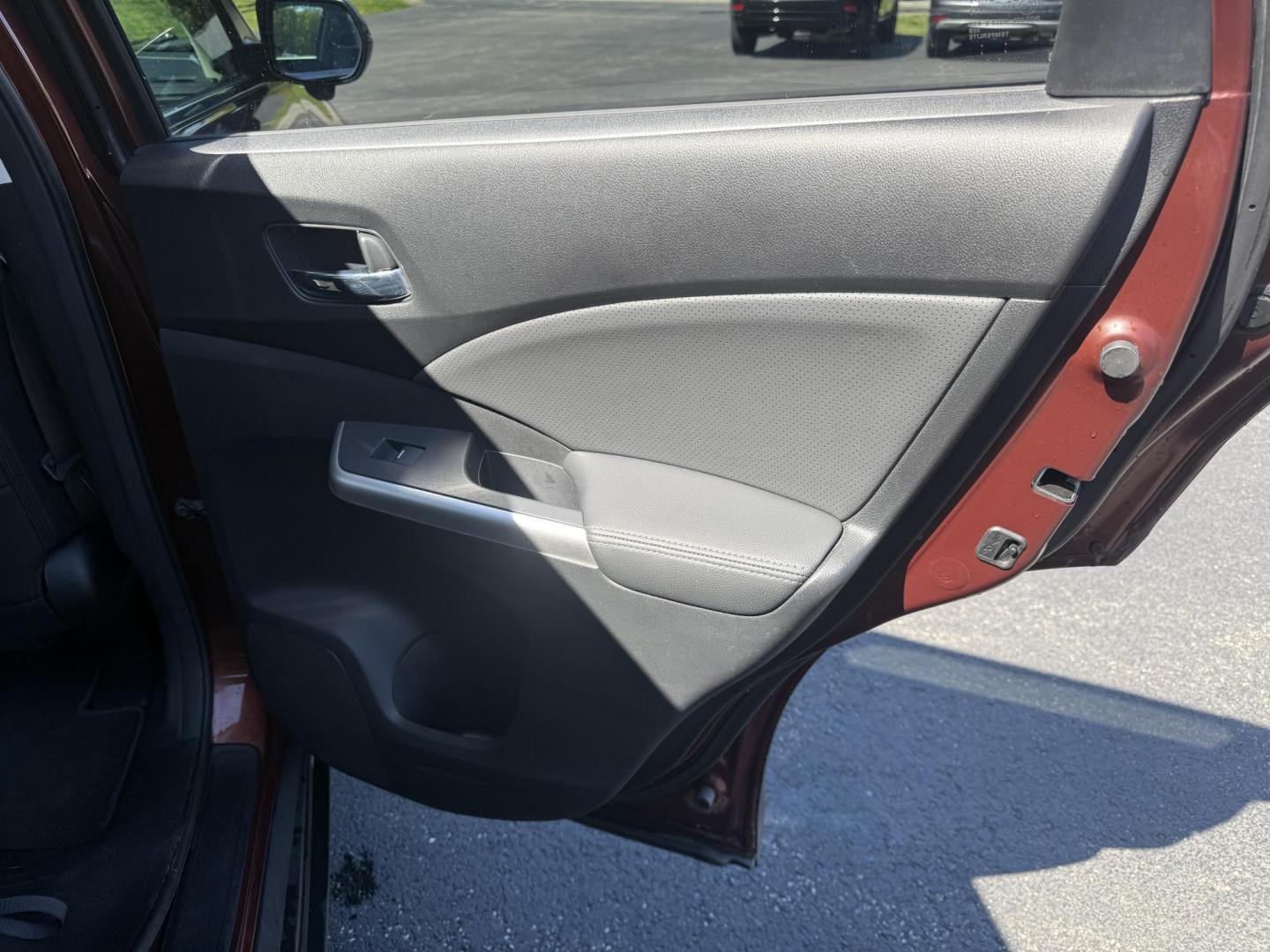 2015 Red /Black Honda CR-V EX-L 4WD (2HKRM4H73FH) with an 2.4L I4 DOHC 16V engine, Automatic transmission, located at 11115 Chardon Rd. , Chardon, OH, 44024, (440) 214-9705, 41.580246, -81.241943 - This One Owner 2015 Honda CR-V EX-L AWD has luxury, reliability and, fuel efficiency. Powered by Honda's incredible 2.4 I4 Engine and CVT (Continuously Variable Transmission) it achieves up to 32 MPG Highway while still have all weather capability due to it's all wheel drive system. With a leather i - Photo#42