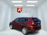 2015 Red /Black Honda CR-V EX-L 4WD (2HKRM4H73FH) with an 2.4L I4 DOHC 16V engine, Automatic transmission, located at 11115 Chardon Rd. , Chardon, OH, 44024, (440) 214-9705, 41.580246, -81.241943 - This One Owner 2015 Honda CR-V EX-L AWD has luxury, reliability and, fuel efficiency. Powered by Honda's incredible 2.4 I4 Engine and CVT (Continuously Variable Transmission) it achieves up to 32 MPG Highway while still have all weather capability due to it's all wheel drive system. With a leather i - Photo#44