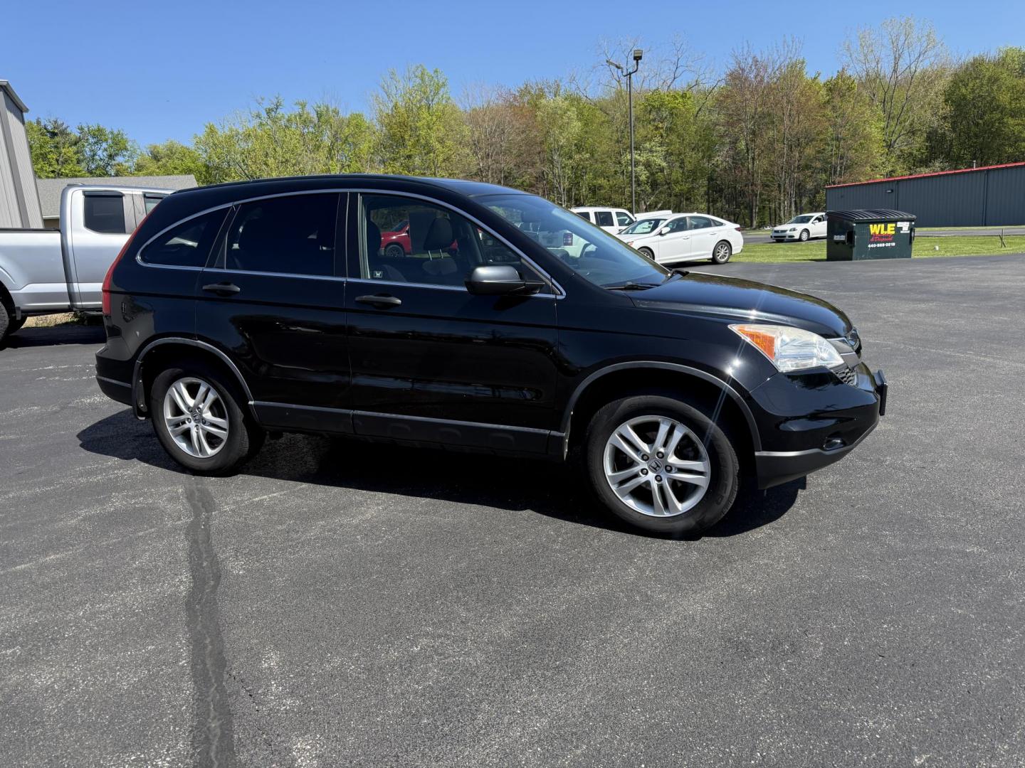 2011 Black /Black Honda CR-V EX 4WD 5-Speed AT (JHLRE4H55BC) with an 2.4L I4 DOHC 16V engine, 5-Speed Automatic transmission, located at 11115 Chardon Rd. , Chardon, OH, 44024, (440) 214-9705, 41.580246, -81.241943 - This One Owner 2011 Honda CR-V EX 4WD is a great fuel efficient all weather SUV. With Honda's incredible reputation for reliability and only 66 K miles this car is poised for a long life to come. Powered by a 2.4 I4 engine and a 5 speed automatic engine this little SUV achieves an impressive 27 MPG - Photo#3