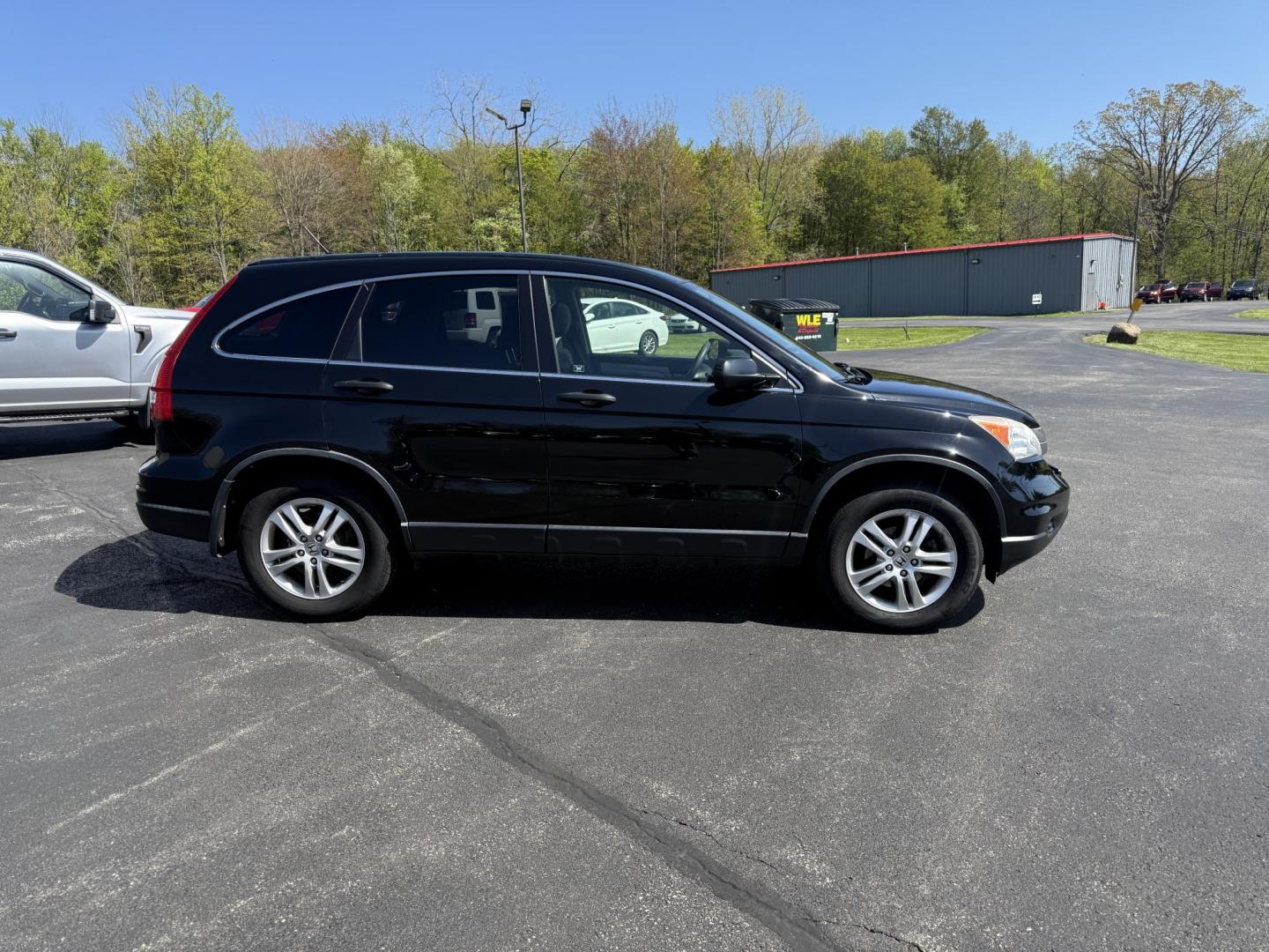 2011 Black /Black Honda CR-V EX 4WD 5-Speed AT (JHLRE4H55BC) with an 2.4L I4 DOHC 16V engine, 5-Speed Automatic transmission, located at 11115 Chardon Rd. , Chardon, OH, 44024, (440) 214-9705, 41.580246, -81.241943 - This One Owner 2011 Honda CR-V EX 4WD is a great fuel efficient all weather SUV. With Honda's incredible reputation for reliability and only 66 K miles this car is poised for a long life to come. Powered by a 2.4 I4 engine and a 5 speed automatic engine this little SUV achieves an impressive 27 MPG - Photo#5