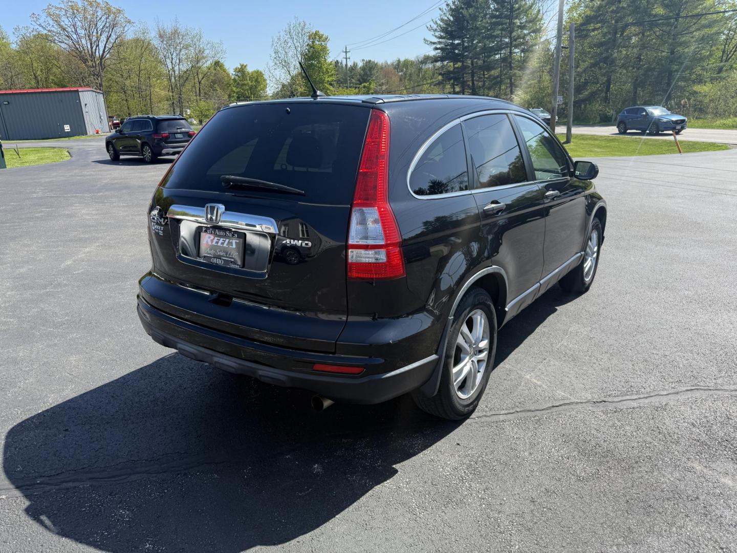 2011 Black /Black Honda CR-V EX 4WD 5-Speed AT (JHLRE4H55BC) with an 2.4L I4 DOHC 16V engine, 5-Speed Automatic transmission, located at 11115 Chardon Rd. , Chardon, OH, 44024, (440) 214-9705, 41.580246, -81.241943 - This One Owner 2011 Honda CR-V EX 4WD is a great fuel efficient all weather SUV. With Honda's incredible reputation for reliability and only 66 K miles this car is poised for a long life to come. Powered by a 2.4 I4 engine and a 5 speed automatic engine this little SUV achieves an impressive 27 MPG - Photo#7