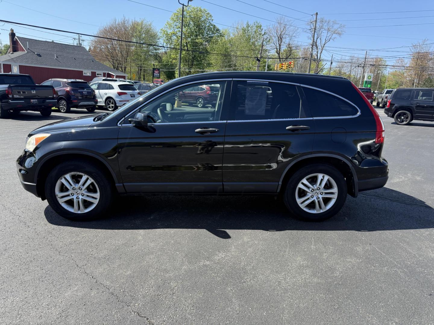 2011 Black /Black Honda CR-V EX 4WD 5-Speed AT (JHLRE4H55BC) with an 2.4L I4 DOHC 16V engine, 5-Speed Automatic transmission, located at 11115 Chardon Rd. , Chardon, OH, 44024, (440) 214-9705, 41.580246, -81.241943 - This One Owner 2011 Honda CR-V EX 4WD is a great fuel efficient all weather SUV. With Honda's incredible reputation for reliability and only 66 K miles this car is poised for a long life to come. Powered by a 2.4 I4 engine and a 5 speed automatic engine this little SUV achieves an impressive 27 MPG - Photo#12