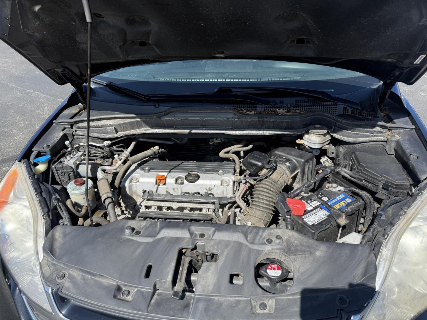 2011 Black /Black Honda CR-V EX 4WD 5-Speed AT (JHLRE4H55BC) with an 2.4L I4 DOHC 16V engine, 5-Speed Automatic transmission, located at 11115 Chardon Rd. , Chardon, OH, 44024, (440) 214-9705, 41.580246, -81.241943 - This One Owner 2011 Honda CR-V EX 4WD is a great fuel efficient all weather SUV. With Honda's incredible reputation for reliability and only 66 K miles this car is poised for a long life to come. Powered by a 2.4 I4 engine and a 5 speed automatic engine this little SUV achieves an impressive 27 MPG - Photo#14