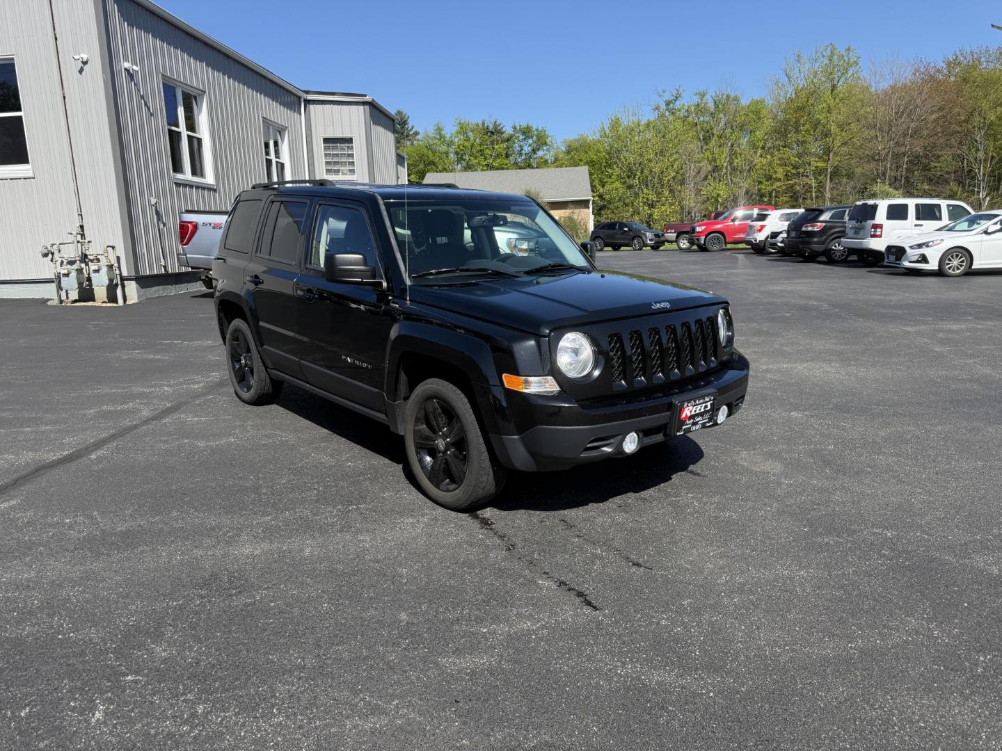2014 Black /Black Jeep Patriot Latitude 4WD (1C4NJRFB8ED) with an 2.4L I4 DOHC 16V engine, 6 Speed Automatic transmission, located at 11115 Chardon Rd. , Chardon, OH, 44024, (440) 214-9705, 41.580246, -81.241943 - This One Owner 2014 Jeep Patriot Latitude 4WD is the perfect small SUV. Powered by a 2.4 I4 Multiair Engine and a 6 Speed Automatic this Jeep achieves up to 27 MPG Highway while still having Jeep's incredible all weather capability. With heated front seats, remote start and, an auto dimming rearview - Photo#2