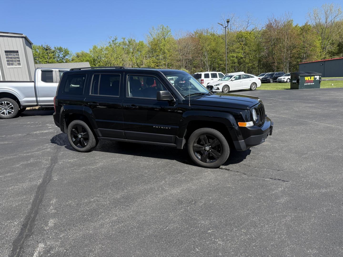 2014 Black /Black Jeep Patriot Latitude 4WD (1C4NJRFB8ED) with an 2.4L I4 DOHC 16V engine, 6 Speed Automatic transmission, located at 11115 Chardon Rd. , Chardon, OH, 44024, (440) 214-9705, 41.580246, -81.241943 - This One Owner 2014 Jeep Patriot Latitude 4WD is the perfect small SUV. Powered by a 2.4 I4 Multiair Engine and a 6 Speed Automatic this Jeep achieves up to 27 MPG Highway while still having Jeep's incredible all weather capability. With heated front seats, remote start and, an auto dimming rearview - Photo#3