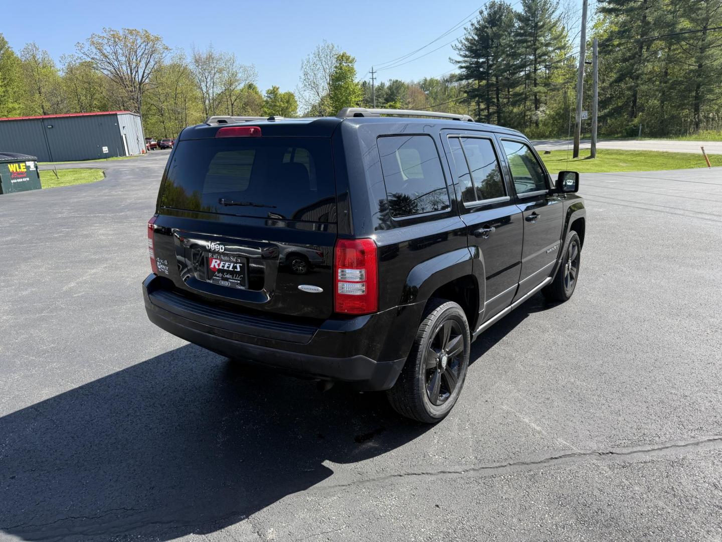 2014 Black /Black Jeep Patriot Latitude 4WD (1C4NJRFB8ED) with an 2.4L I4 DOHC 16V engine, 6 Speed Automatic transmission, located at 11115 Chardon Rd. , Chardon, OH, 44024, (440) 214-9705, 41.580246, -81.241943 - This One Owner 2014 Jeep Patriot Latitude 4WD is the perfect small SUV. Powered by a 2.4 I4 Multiair Engine and a 6 Speed Automatic this Jeep achieves up to 27 MPG Highway while still having Jeep's incredible all weather capability. With heated front seats, remote start and, an auto dimming rearview - Photo#7