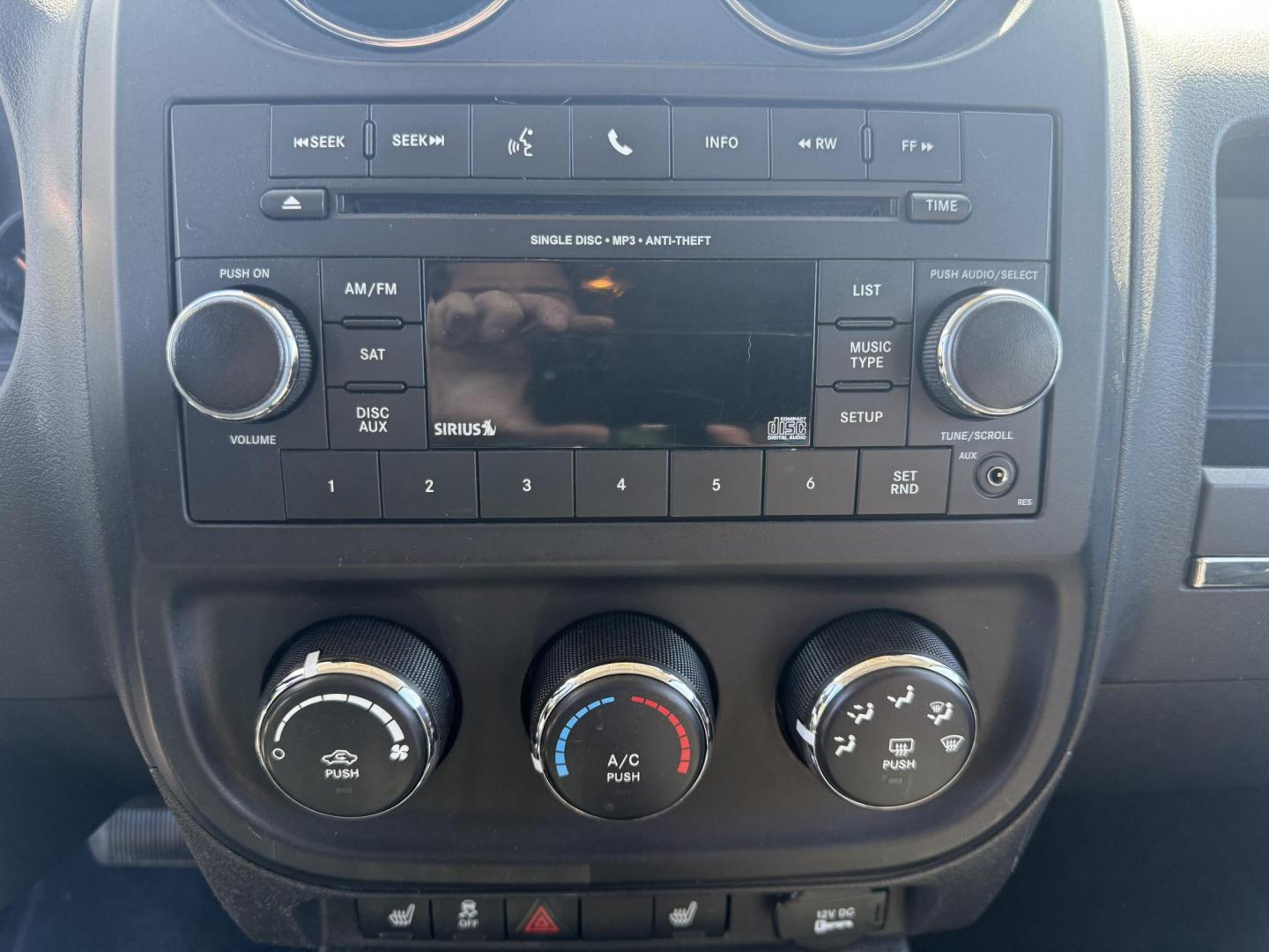 2014 Black /Black Jeep Patriot Latitude 4WD (1C4NJRFB8ED) with an 2.4L I4 DOHC 16V engine, 6 Speed Automatic transmission, located at 11115 Chardon Rd. , Chardon, OH, 44024, (440) 214-9705, 41.580246, -81.241943 - This One Owner 2014 Jeep Patriot Latitude 4WD is the perfect small SUV. Powered by a 2.4 I4 Multiair Engine and a 6 Speed Automatic this Jeep achieves up to 27 MPG Highway while still having Jeep's incredible all weather capability. With heated front seats, remote start and, an auto dimming rearview - Photo#22