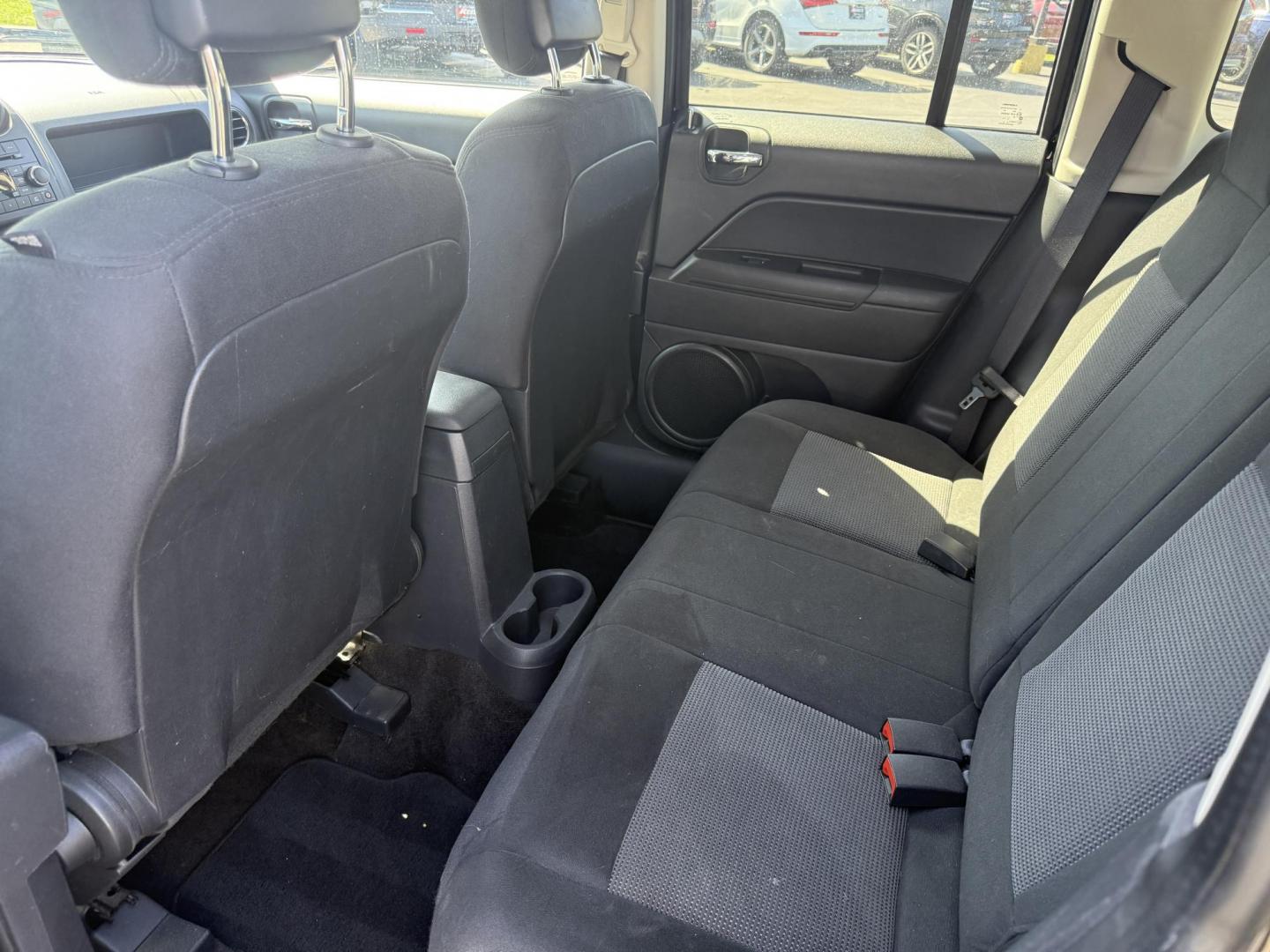 2014 Black /Black Jeep Patriot Latitude 4WD (1C4NJRFB8ED) with an 2.4L I4 DOHC 16V engine, 6 Speed Automatic transmission, located at 11115 Chardon Rd. , Chardon, OH, 44024, (440) 214-9705, 41.580246, -81.241943 - This One Owner 2014 Jeep Patriot Latitude 4WD is the perfect small SUV. Powered by a 2.4 I4 Multiair Engine and a 6 Speed Automatic this Jeep achieves up to 27 MPG Highway while still having Jeep's incredible all weather capability. With heated front seats, remote start and, an auto dimming rearview - Photo#25