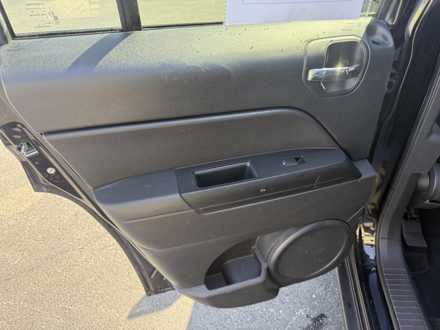 2014 Black /Black Jeep Patriot Latitude 4WD (1C4NJRFB8ED) with an 2.4L I4 DOHC 16V engine, 6 Speed Automatic transmission, located at 11115 Chardon Rd. , Chardon, OH, 44024, (440) 214-9705, 41.580246, -81.241943 - This One Owner 2014 Jeep Patriot Latitude 4WD is the perfect small SUV. Powered by a 2.4 I4 Multiair Engine and a 6 Speed Automatic this Jeep achieves up to 27 MPG Highway while still having Jeep's incredible all weather capability. With heated front seats, remote start and, an auto dimming rearview - Photo#26