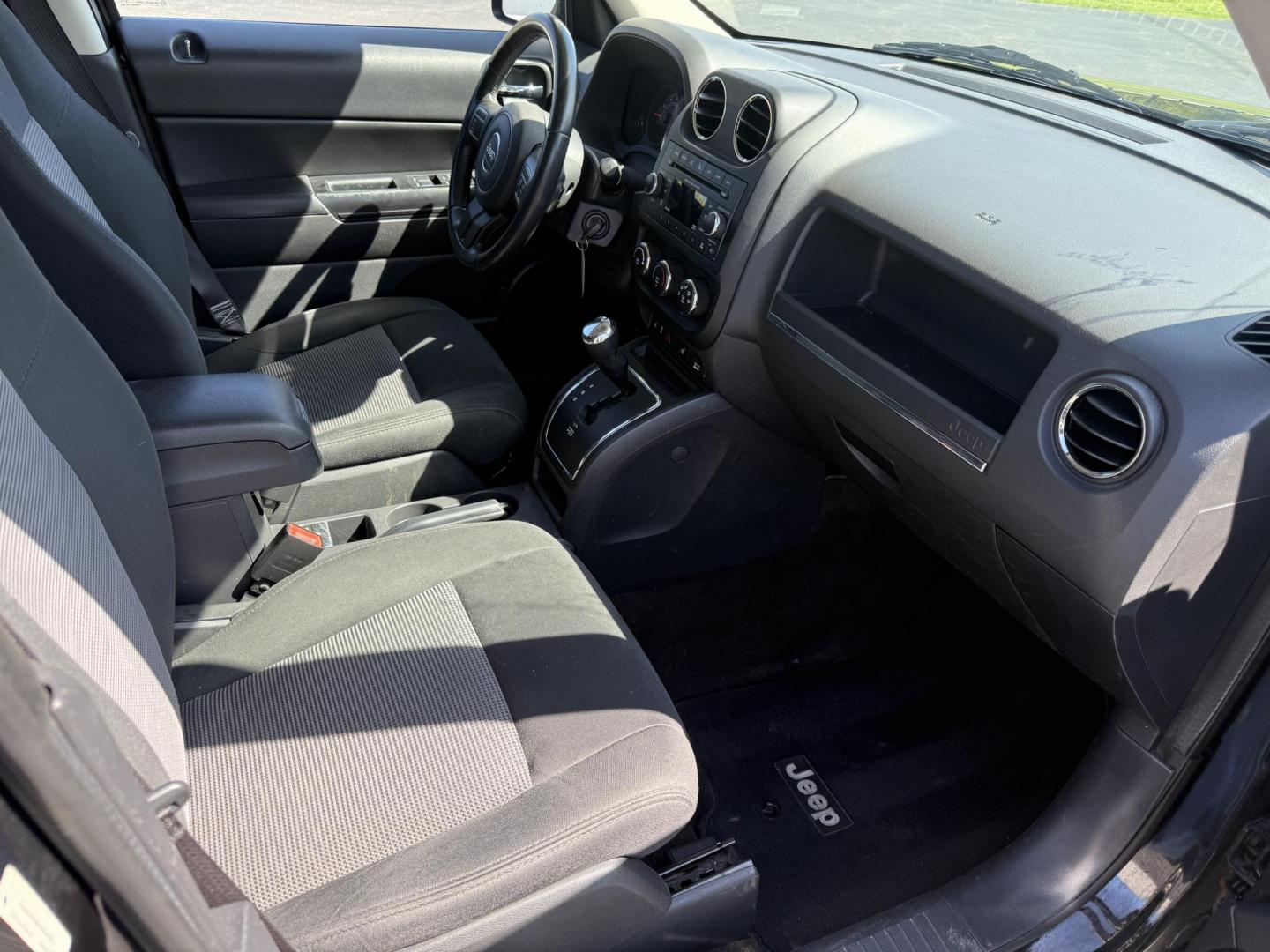 2014 Black /Black Jeep Patriot Latitude 4WD (1C4NJRFB8ED) with an 2.4L I4 DOHC 16V engine, 6 Speed Automatic transmission, located at 11115 Chardon Rd. , Chardon, OH, 44024, (440) 214-9705, 41.580246, -81.241943 - This One Owner 2014 Jeep Patriot Latitude 4WD is the perfect small SUV. Powered by a 2.4 I4 Multiair Engine and a 6 Speed Automatic this Jeep achieves up to 27 MPG Highway while still having Jeep's incredible all weather capability. With heated front seats, remote start and, an auto dimming rearview - Photo#33