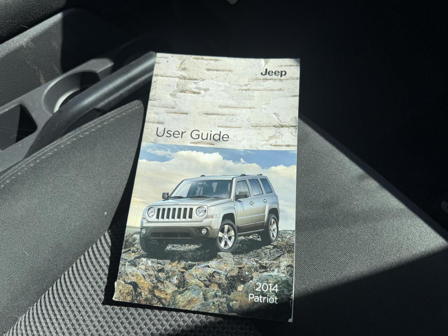 2014 Black /Black Jeep Patriot Latitude 4WD (1C4NJRFB8ED) with an 2.4L I4 DOHC 16V engine, 6 Speed Automatic transmission, located at 11115 Chardon Rd. , Chardon, OH, 44024, (440) 214-9705, 41.580246, -81.241943 - This One Owner 2014 Jeep Patriot Latitude 4WD is the perfect small SUV. Powered by a 2.4 I4 Multiair Engine and a 6 Speed Automatic this Jeep achieves up to 27 MPG Highway while still having Jeep's incredible all weather capability. With heated front seats, remote start and, an auto dimming rearview - Photo#34