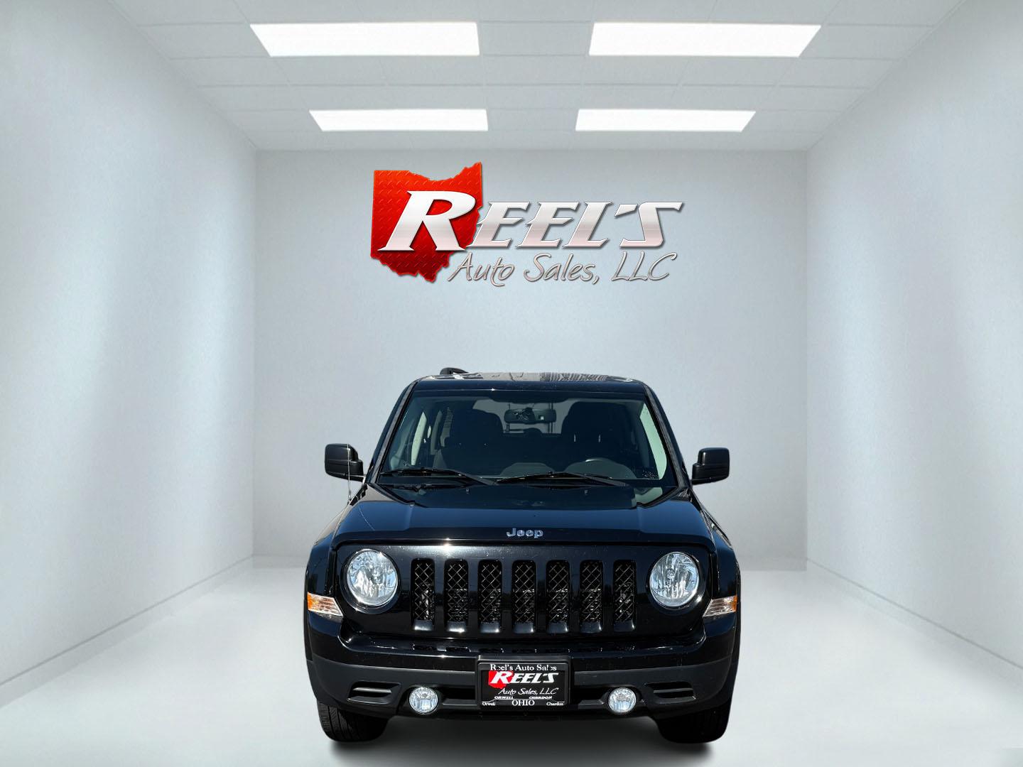 2014 Black /Black Jeep Patriot Latitude 4WD (1C4NJRFB8ED) with an 2.4L I4 DOHC 16V engine, 6 Speed Automatic transmission, located at 11115 Chardon Rd. , Chardon, OH, 44024, (440) 214-9705, 41.580246, -81.241943 - This One Owner 2014 Jeep Patriot Latitude 4WD is the perfect small SUV. Powered by a 2.4 I4 Multiair Engine and a 6 Speed Automatic this Jeep achieves up to 27 MPG Highway while still having Jeep's incredible all weather capability. With heated front seats, remote start and, an auto dimming rearview - Photo#1