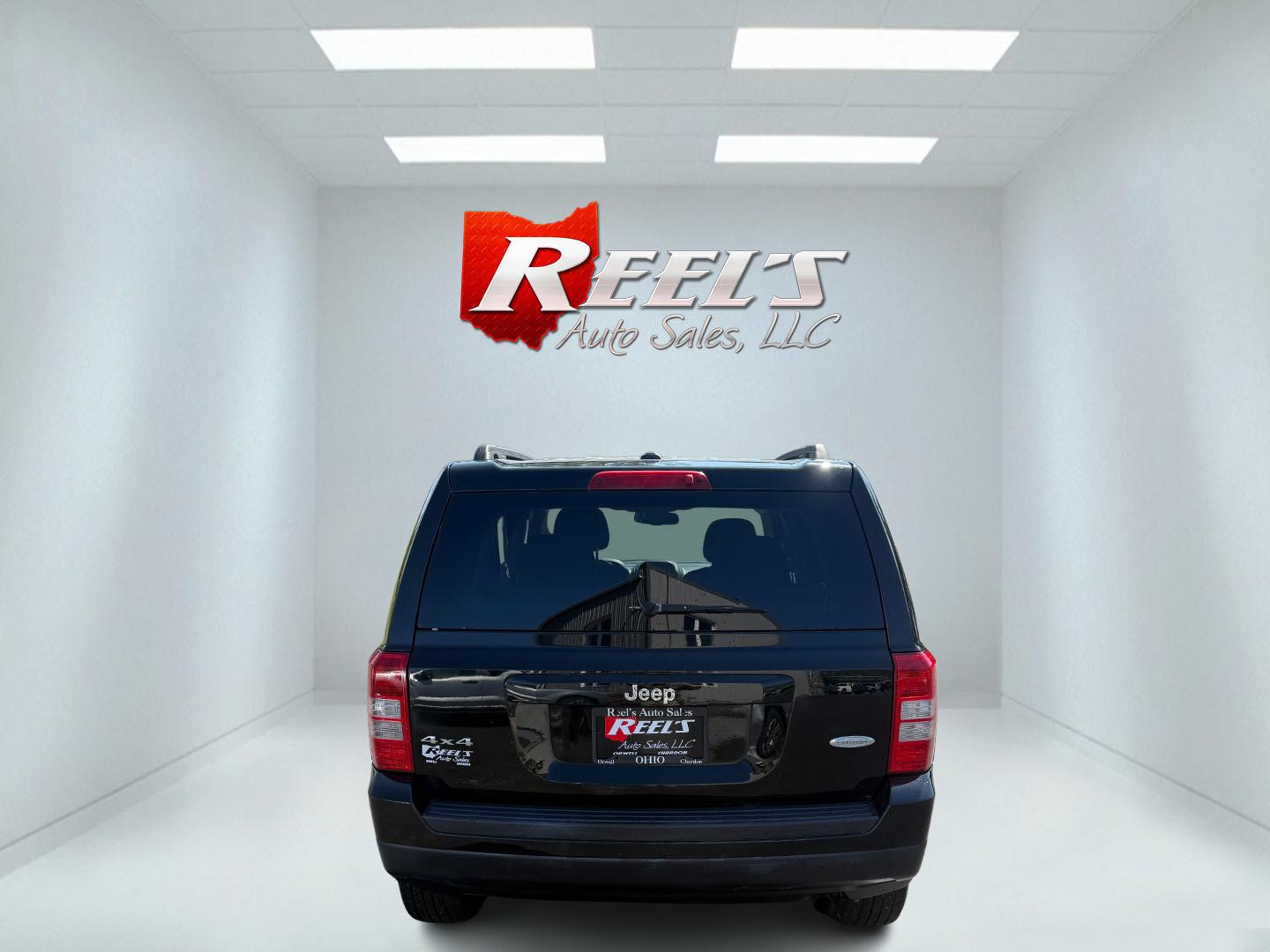 2014 Black /Black Jeep Patriot Latitude 4WD (1C4NJRFB8ED) with an 2.4L I4 DOHC 16V engine, 6 Speed Automatic transmission, located at 11115 Chardon Rd. , Chardon, OH, 44024, (440) 214-9705, 41.580246, -81.241943 - This One Owner 2014 Jeep Patriot Latitude 4WD is the perfect small SUV. Powered by a 2.4 I4 Multiair Engine and a 6 Speed Automatic this Jeep achieves up to 27 MPG Highway while still having Jeep's incredible all weather capability. With heated front seats, remote start and, an auto dimming rearview - Photo#33