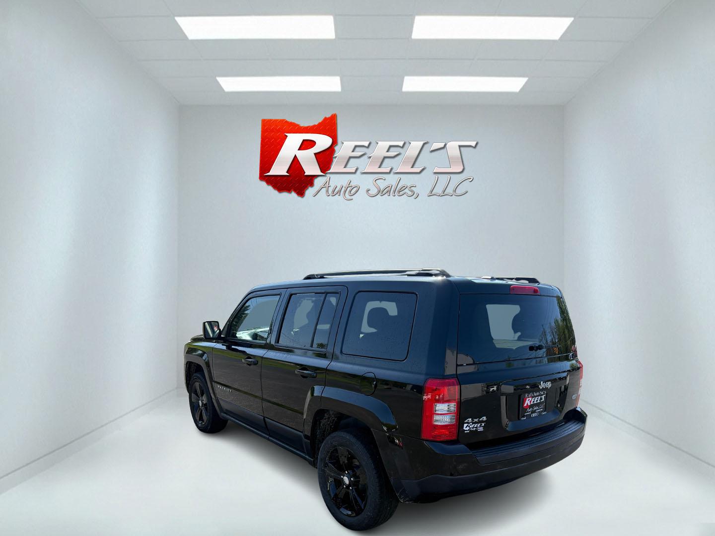 2014 Black /Black Jeep Patriot Latitude 4WD (1C4NJRFB8ED) with an 2.4L I4 DOHC 16V engine, 6 Speed Automatic transmission, located at 11115 Chardon Rd. , Chardon, OH, 44024, (440) 214-9705, 41.580246, -81.241943 - This One Owner 2014 Jeep Patriot Latitude 4WD is the perfect small SUV. Powered by a 2.4 I4 Multiair Engine and a 6 Speed Automatic this Jeep achieves up to 27 MPG Highway while still having Jeep's incredible all weather capability. With heated front seats, remote start and, an auto dimming rearview - Photo#34