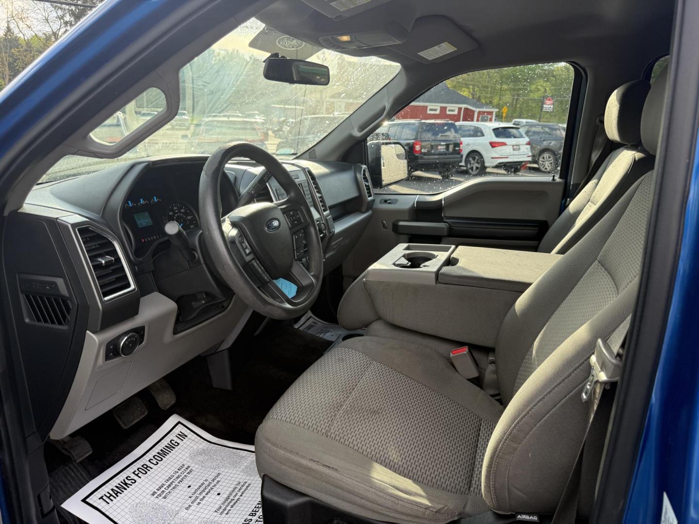 2015 Blue /Gray Ford F-150 XLT SuperCrew 5.5-ft. Bed 4WD (1FTEW1EF5FF) with an 5.0L V8 engine, 6-Speed Automatic transmission, located at 11115 Chardon Rd. , Chardon, OH, 44024, (440) 214-9705, 41.580246, -81.241943 - This 2015 Ford F-150 is a versatile and capably 1/2 ton truck. Powered by the 5.0 Coyote V8 Engine and a 6 Speed Automatic this truck sounds and looks great. With 3.31 Gearing you can tow just about anything you could ever need with a 9,000 pound towing capacity. This truck is equipped with daytime - Photo#3