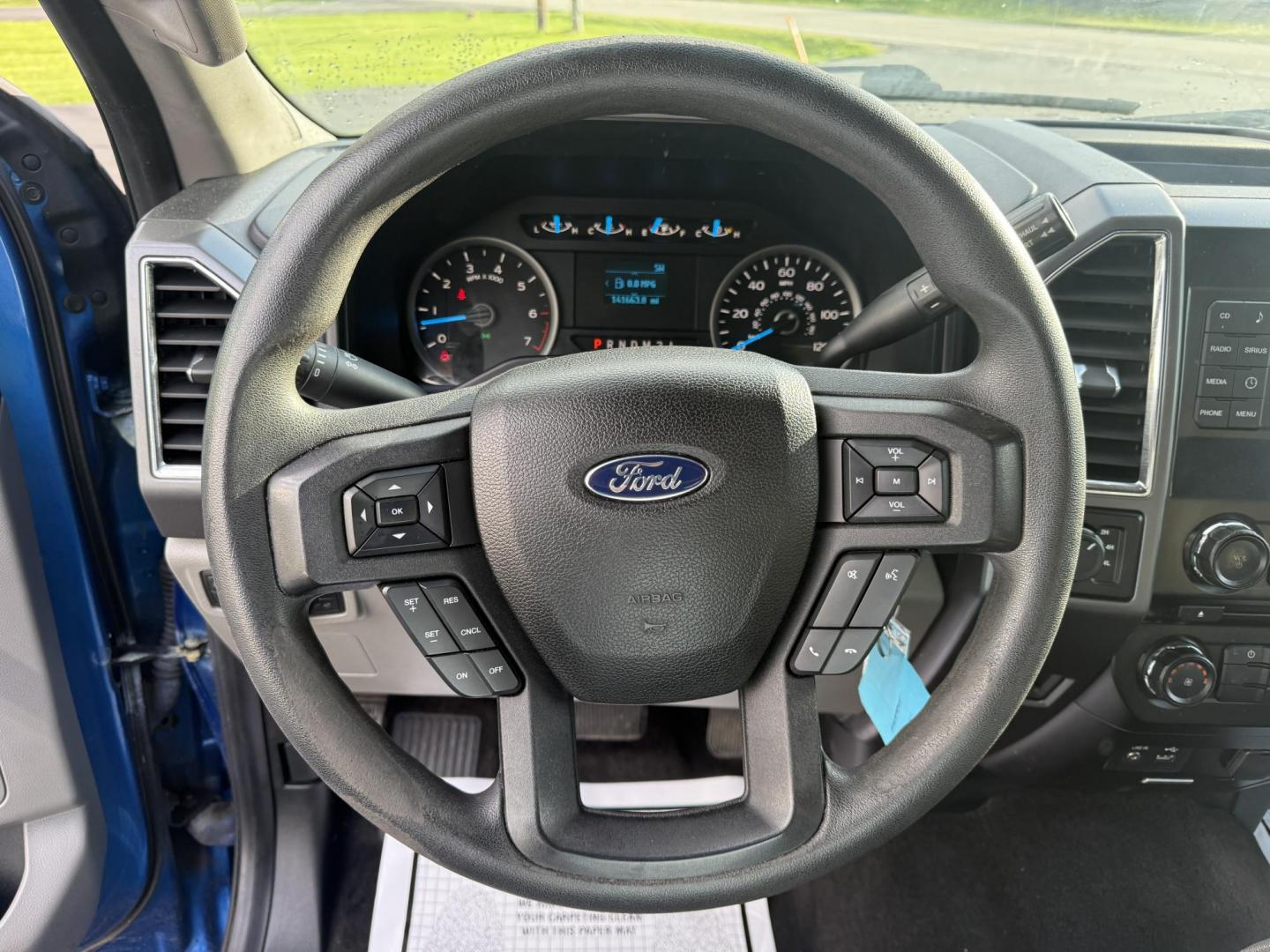 2015 Blue /Gray Ford F-150 XLT SuperCrew 5.5-ft. Bed 4WD (1FTEW1EF5FF) with an 5.0L V8 engine, 6-Speed Automatic transmission, located at 11115 Chardon Rd. , Chardon, OH, 44024, (440) 214-9705, 41.580246, -81.241943 - This 2015 Ford F-150 is a versatile and capably 1/2 ton truck. Powered by the 5.0 Coyote V8 Engine and a 6 Speed Automatic this truck sounds and looks great. With 3.31 Gearing you can tow just about anything you could ever need with a 9,000 pound towing capacity. This truck is equipped with daytime - Photo#16