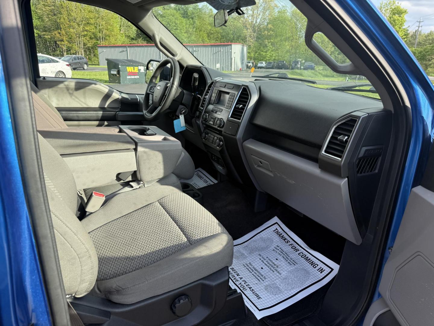 2015 Blue /Gray Ford F-150 XLT SuperCrew 5.5-ft. Bed 4WD (1FTEW1EF5FF) with an 5.0L V8 engine, 6-Speed Automatic transmission, located at 11115 Chardon Rd. , Chardon, OH, 44024, (440) 214-9705, 41.580246, -81.241943 - This 2015 Ford F-150 is a versatile and capably 1/2 ton truck. Powered by the 5.0 Coyote V8 Engine and a 6 Speed Automatic this truck sounds and looks great. With 3.31 Gearing you can tow just about anything you could ever need with a 9,000 pound towing capacity. This truck is equipped with daytime - Photo#25