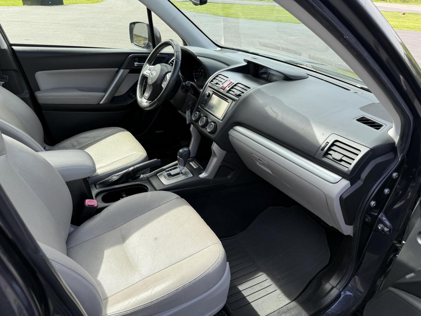 2014 Gray /Gray Subaru Forester 2.5i Touring (JF2SJAMC2EH) with an 2.5L H4 DOHC 16V engine, Automatic transmission, located at 11115 Chardon Rd. , Chardon, OH, 44024, (440) 214-9705, 41.580246, -81.241943 - This One Owner 2014 Subaru Forester 2.5i Touring with a 2.5L H4 engine offers a well-equipped, versatile SUV featuring Subaru’s symmetrical AWD system and X-MODE for enhanced off-road and slippery surface handling. It boasts a comfortable leather interior, power driver’s seat, heated front seat - Photo#35