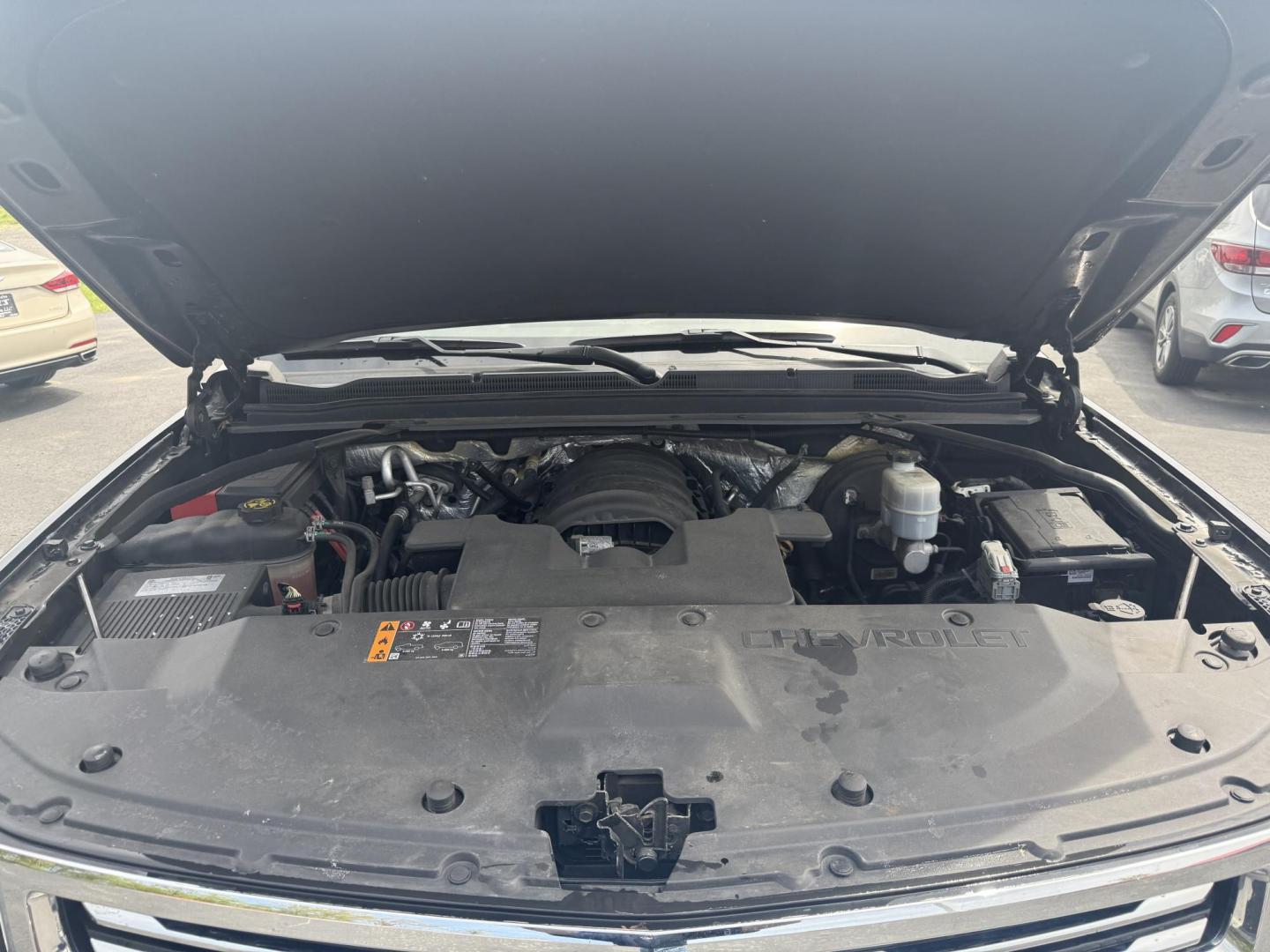 2018 Black /Brown Chevrolet Tahoe Premier 4WD (1GNSKCKC4JR) with an 5.3L V8 OHV 16V engine, 6A transmission, located at 547 E. Main St., Orwell, OH, 44076, (440) 437-5893, 41.535435, -80.847855 - This 2018 Chevrolet Tahoe Premier 4WD with a 5.3L EcoTec3 V8 engine offers robust power and impressive towing capacity of 8,200 pounds, making it ideal for hauling and family adventures. It features a luxurious leather interior with heated and cooled front seats, heated second-row captain’s chairs - Photo#3