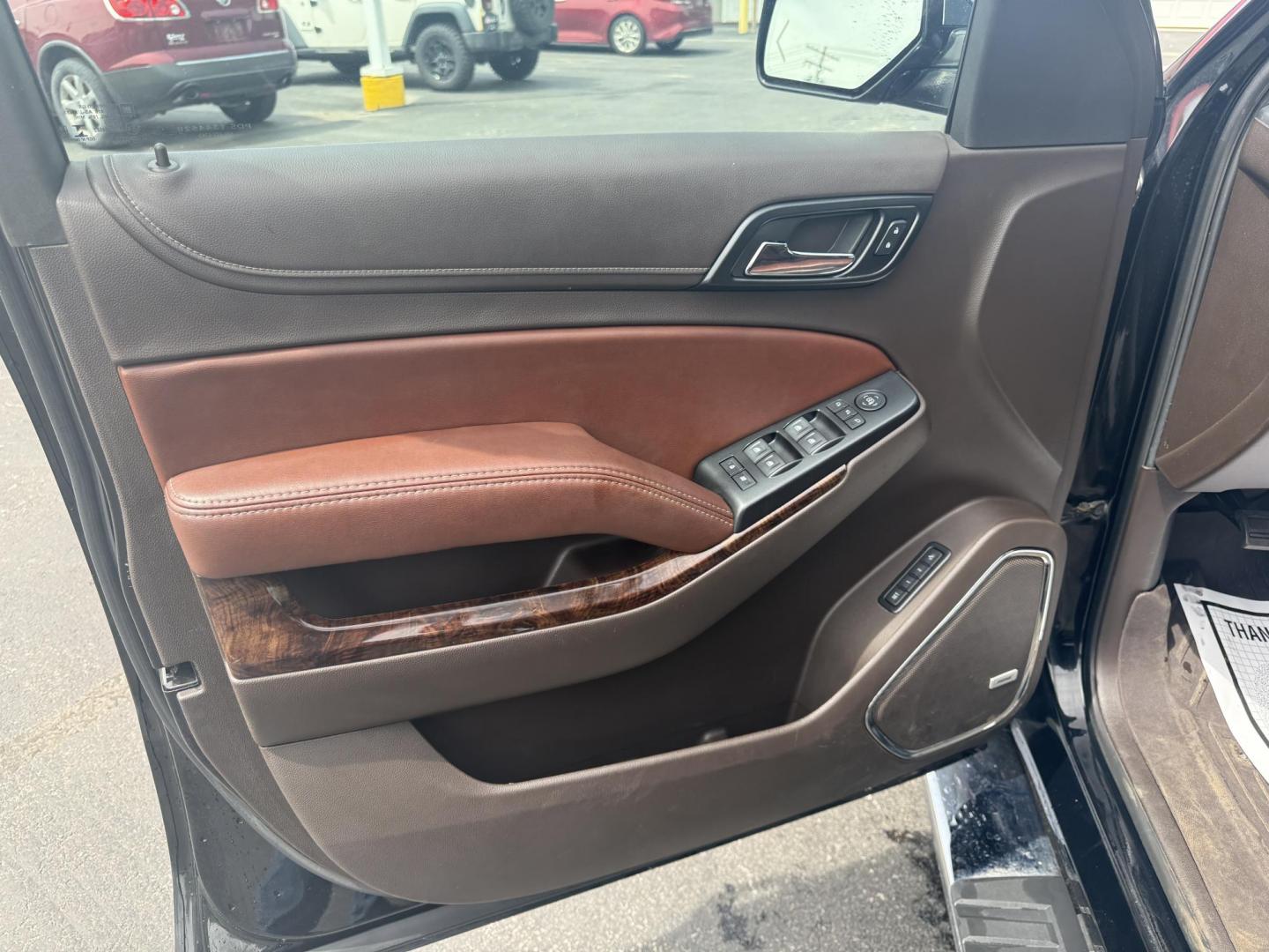 2018 Black /Brown Chevrolet Tahoe Premier 4WD (1GNSKCKC4JR) with an 5.3L V8 OHV 16V engine, 6A transmission, located at 547 E. Main St., Orwell, OH, 44076, (440) 437-5893, 41.535435, -80.847855 - This 2018 Chevrolet Tahoe Premier 4WD with a 5.3L EcoTec3 V8 engine offers robust power and impressive towing capacity of 8,200 pounds, making it ideal for hauling and family adventures. It features a luxurious leather interior with heated and cooled front seats, heated second-row captain’s chairs - Photo#5