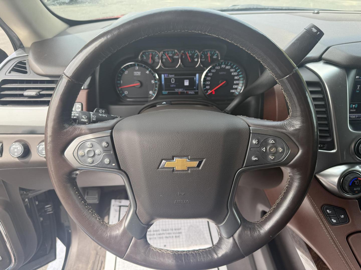 2018 Black /Brown Chevrolet Tahoe Premier 4WD (1GNSKCKC4JR) with an 5.3L V8 OHV 16V engine, 6A transmission, located at 547 E. Main St., Orwell, OH, 44076, (440) 437-5893, 41.535435, -80.847855 - This 2018 Chevrolet Tahoe Premier 4WD with a 5.3L EcoTec3 V8 engine offers robust power and impressive towing capacity of 8,200 pounds, making it ideal for hauling and family adventures. It features a luxurious leather interior with heated and cooled front seats, heated second-row captain’s chairs - Photo#19