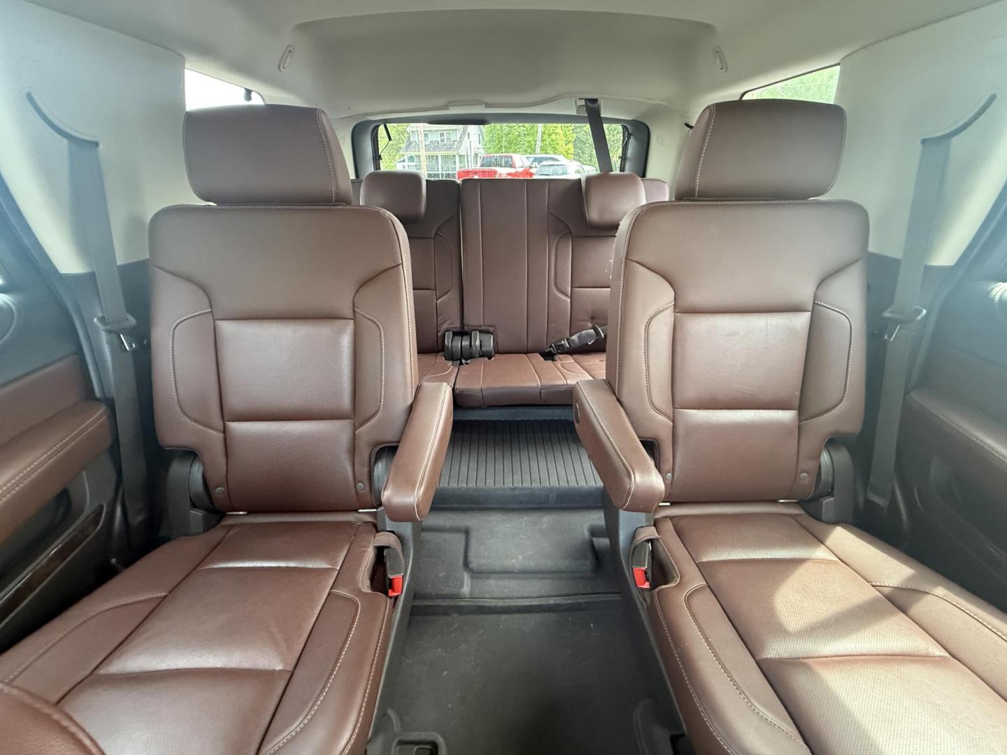 2018 Black /Brown Chevrolet Tahoe Premier 4WD (1GNSKCKC4JR) with an 5.3L V8 OHV 16V engine, 6A transmission, located at 547 E. Main St., Orwell, OH, 44076, (440) 437-5893, 41.535435, -80.847855 - This 2018 Chevrolet Tahoe Premier 4WD with a 5.3L EcoTec3 V8 engine offers robust power and impressive towing capacity of 8,200 pounds, making it ideal for hauling and family adventures. It features a luxurious leather interior with heated and cooled front seats, heated second-row captain’s chairs - Photo#26