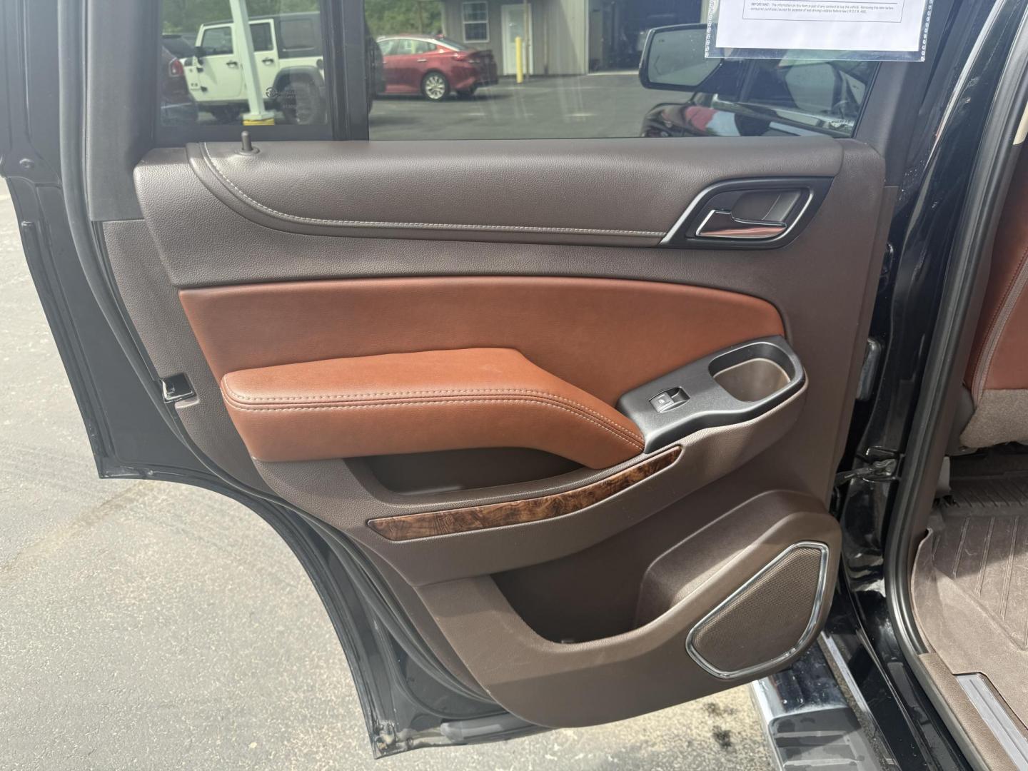2018 Black /Brown Chevrolet Tahoe Premier 4WD (1GNSKCKC4JR) with an 5.3L V8 OHV 16V engine, 6A transmission, located at 547 E. Main St., Orwell, OH, 44076, (440) 437-5893, 41.535435, -80.847855 - This 2018 Chevrolet Tahoe Premier 4WD with a 5.3L EcoTec3 V8 engine offers robust power and impressive towing capacity of 8,200 pounds, making it ideal for hauling and family adventures. It features a luxurious leather interior with heated and cooled front seats, heated second-row captain’s chairs - Photo#28