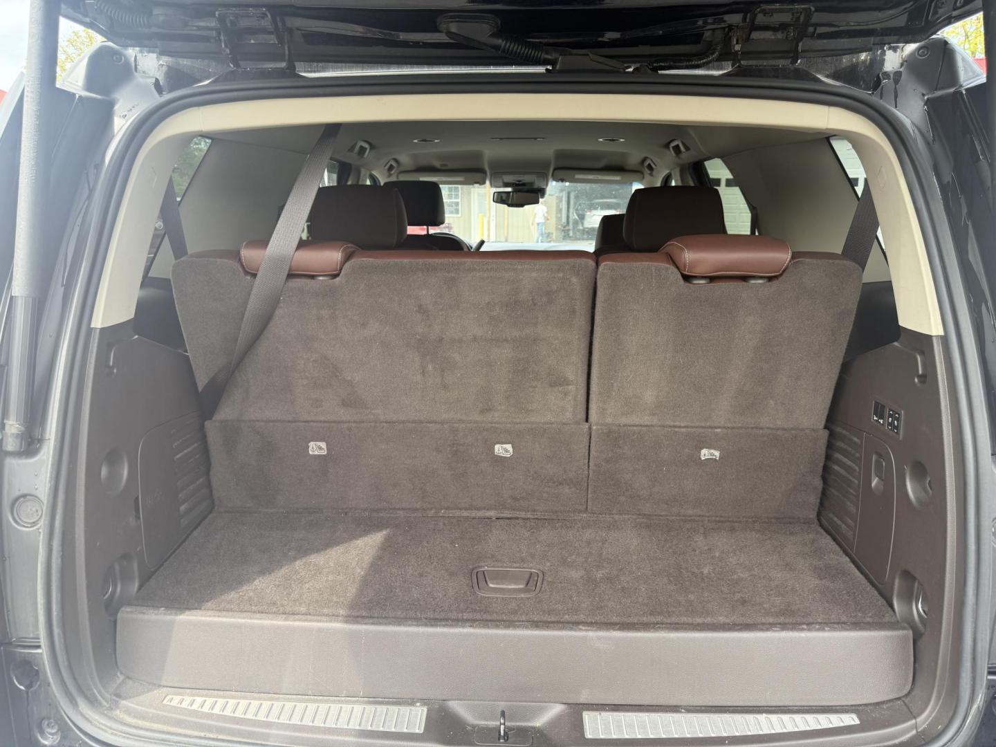 2018 Black /Brown Chevrolet Tahoe Premier 4WD (1GNSKCKC4JR) with an 5.3L V8 OHV 16V engine, 6A transmission, located at 547 E. Main St., Orwell, OH, 44076, (440) 437-5893, 41.535435, -80.847855 - This 2018 Chevrolet Tahoe Premier 4WD with a 5.3L EcoTec3 V8 engine offers robust power and impressive towing capacity of 8,200 pounds, making it ideal for hauling and family adventures. It features a luxurious leather interior with heated and cooled front seats, heated second-row captain’s chairs - Photo#32