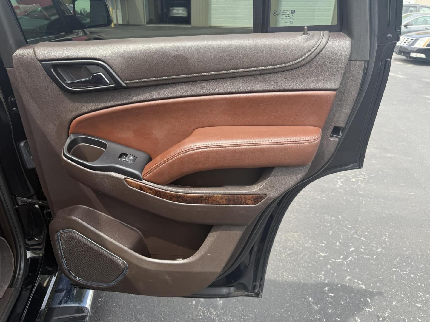 2018 Black /Brown Chevrolet Tahoe Premier 4WD (1GNSKCKC4JR) with an 5.3L V8 OHV 16V engine, 6A transmission, located at 547 E. Main St., Orwell, OH, 44076, (440) 437-5893, 41.535435, -80.847855 - This 2018 Chevrolet Tahoe Premier 4WD with a 5.3L EcoTec3 V8 engine offers robust power and impressive towing capacity of 8,200 pounds, making it ideal for hauling and family adventures. It features a luxurious leather interior with heated and cooled front seats, heated second-row captain’s chairs - Photo#36