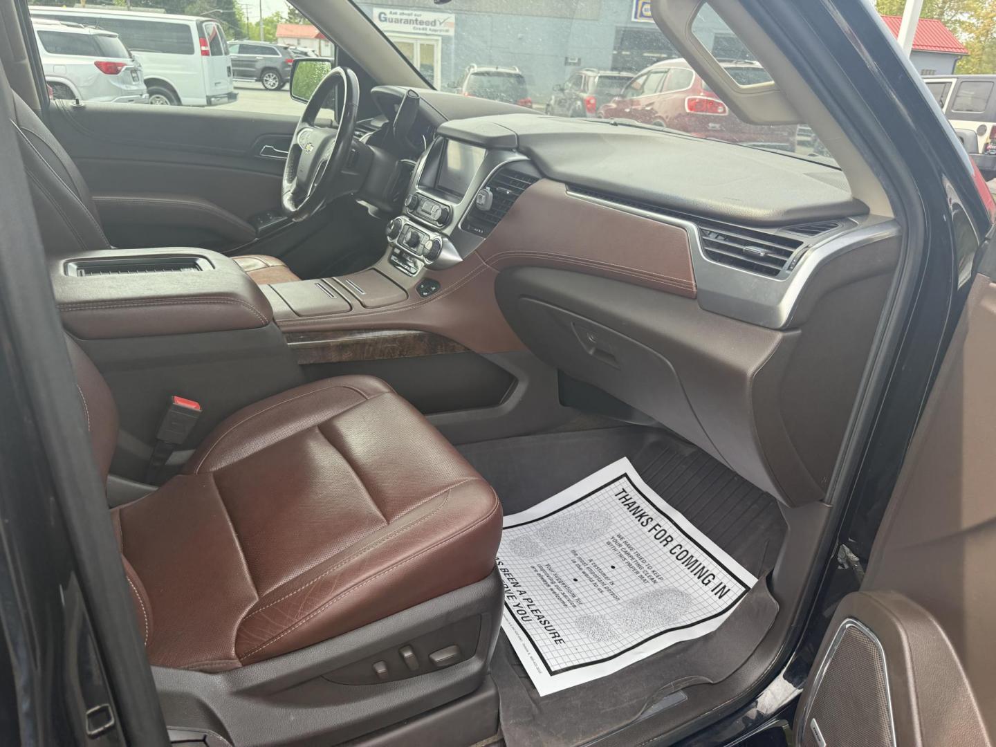 2018 Black /Brown Chevrolet Tahoe Premier 4WD (1GNSKCKC4JR) with an 5.3L V8 OHV 16V engine, 6A transmission, located at 547 E. Main St., Orwell, OH, 44076, (440) 437-5893, 41.535435, -80.847855 - This 2018 Chevrolet Tahoe Premier 4WD with a 5.3L EcoTec3 V8 engine offers robust power and impressive towing capacity of 8,200 pounds, making it ideal for hauling and family adventures. It features a luxurious leather interior with heated and cooled front seats, heated second-row captain’s chairs - Photo#37