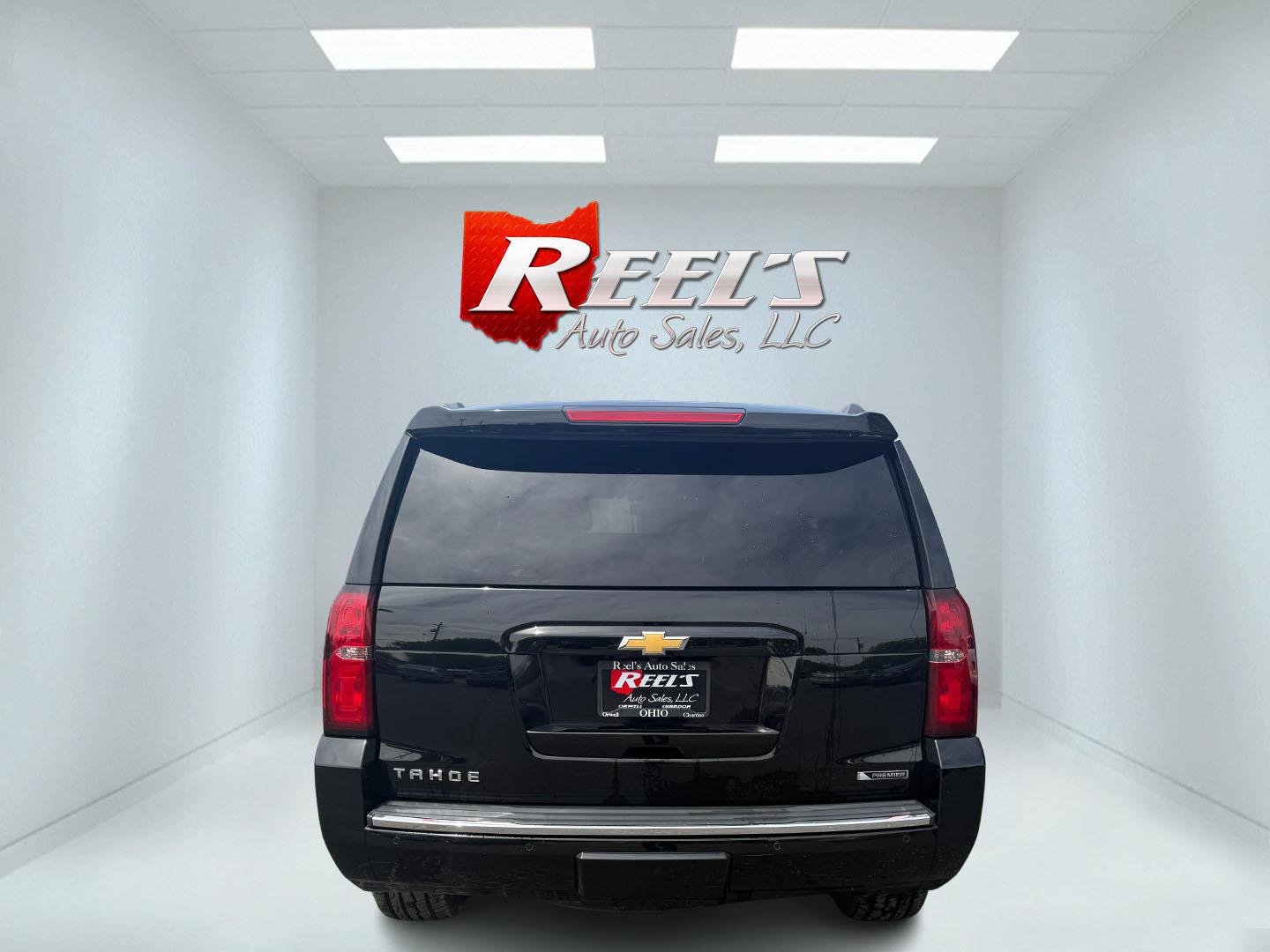 2018 Black /Brown Chevrolet Tahoe Premier 4WD (1GNSKCKC4JR) with an 5.3L V8 OHV 16V engine, 6A transmission, located at 547 E. Main St., Orwell, OH, 44076, (440) 437-5893, 41.535435, -80.847855 - This 2018 Chevrolet Tahoe Premier 4WD with a 5.3L EcoTec3 V8 engine offers robust power and impressive towing capacity of 8,200 pounds, making it ideal for hauling and family adventures. It features a luxurious leather interior with heated and cooled front seats, heated second-row captain’s chairs - Photo#44