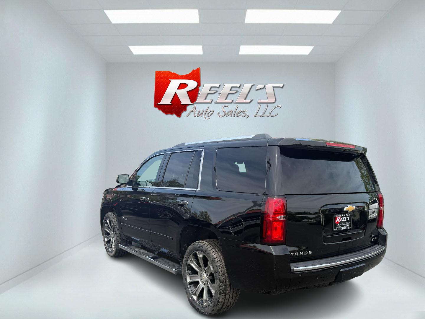 2018 Black /Brown Chevrolet Tahoe Premier 4WD (1GNSKCKC4JR) with an 5.3L V8 OHV 16V engine, 6A transmission, located at 547 E. Main St., Orwell, OH, 44076, (440) 437-5893, 41.535435, -80.847855 - This 2018 Chevrolet Tahoe Premier 4WD with a 5.3L EcoTec3 V8 engine offers robust power and impressive towing capacity of 8,200 pounds, making it ideal for hauling and family adventures. It features a luxurious leather interior with heated and cooled front seats, heated second-row captain’s chairs - Photo#45