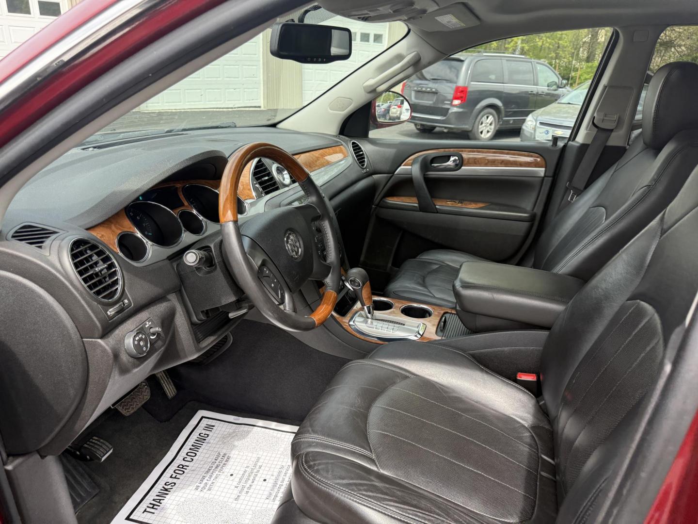 2010 Red /Black Buick Enclave CXL AWD (5GALVBED2AJ) with an 3.6L V6 DOHC 24V engine, 6-Speed Automatic Overdrive transmission, located at 547 E. Main St., Orwell, OH, 44076, (440) 437-5893, 41.535435, -80.847855 - This 2010 Buick Enclave is a true transportation special. With a leather interior, heated front seats, backup camera and a power drivers seat you will be comfortable in North East Ohio's winter months. Come take a look before it's gone. This vehicle is AS IS. - Photo#4