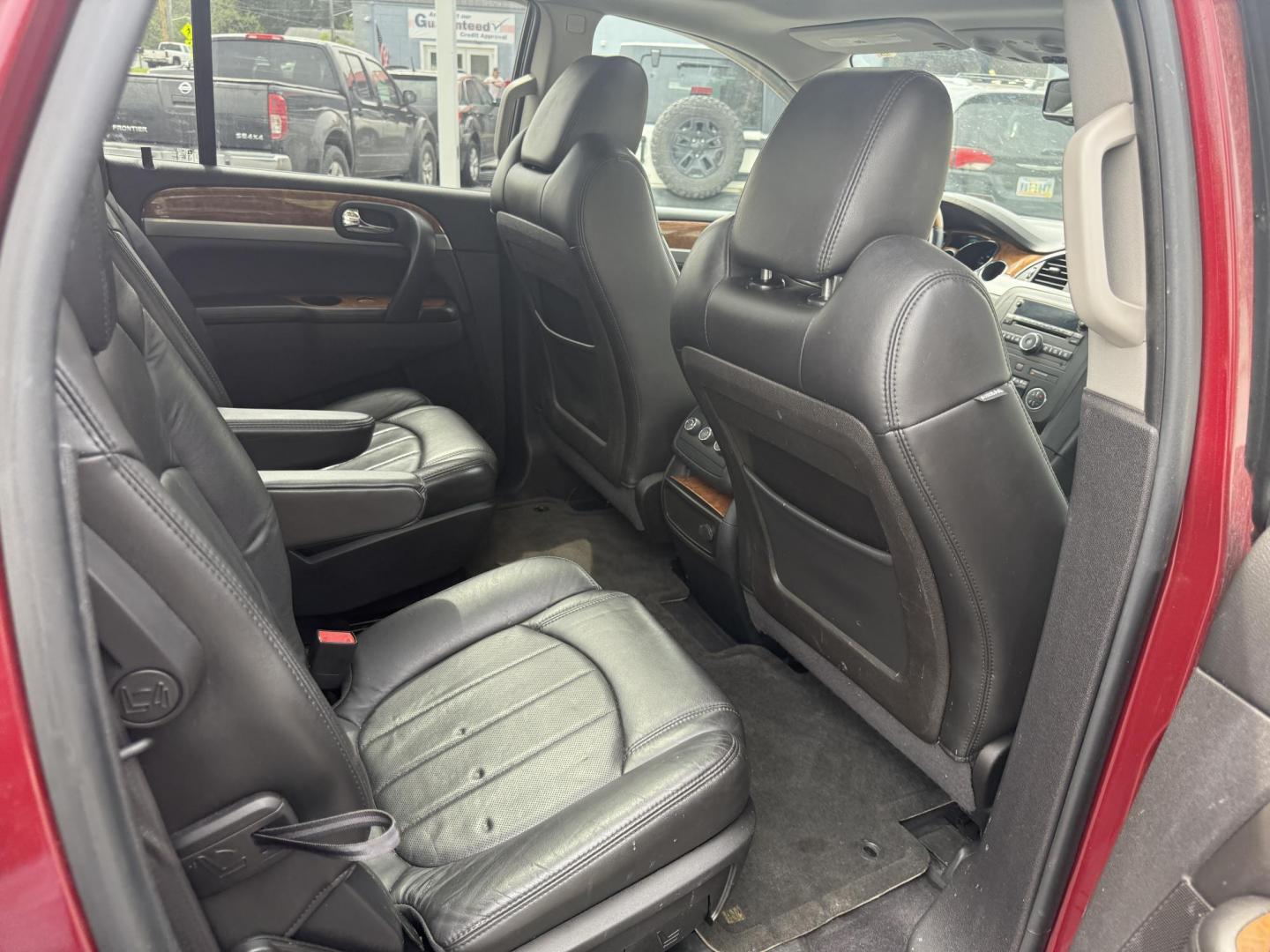2010 Red /Black Buick Enclave CXL AWD (5GALVBED2AJ) with an 3.6L V6 DOHC 24V engine, 6-Speed Automatic Overdrive transmission, located at 547 E. Main St., Orwell, OH, 44076, (440) 437-5893, 41.535435, -80.847855 - This 2010 Buick Enclave is a true transportation special. With a leather interior, heated front seats, backup camera and a power drivers seat you will be comfortable in North East Ohio's winter months. Come take a look before it's gone. This vehicle is AS IS. - Photo#32