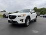 2014 White /Black Mazda CX-5 Touring AWD (JM3KE4CY7E0) with an 2.5L I4 DOHC 16V engine, 6-Speed Automatic transmission, located at 547 E. Main St., Orwell, OH, 44076, (440) 437-5893, 41.535435, -80.847855 - This 2014 Mazda CX-5 Touring features a 2.5L inline-4 engine paired with a 6-speed automatic transmission, offering a balanced blend of performance and efficiency with an estimated 29 MPG on the highway. It comes well-equipped for its class, including a 6.5-inch touchscreen, backup camera, blind spo - Photo#0