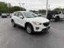 2014 White /Black Mazda CX-5 Touring AWD (JM3KE4CY7E0) with an 2.5L I4 DOHC 16V engine, 6-Speed Automatic transmission, located at 547 E. Main St., Orwell, OH, 44076, (440) 437-5893, 41.535435, -80.847855 - This 2014 Mazda CX-5 Touring features a 2.5L inline-4 engine paired with a 6-speed automatic transmission, offering a balanced blend of performance and efficiency with an estimated 29 MPG on the highway. It comes well-equipped for its class, including a 6.5-inch touchscreen, backup camera, blind spo - Photo#2
