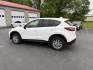 2014 White /Black Mazda CX-5 Touring AWD (JM3KE4CY7E0) with an 2.5L I4 DOHC 16V engine, 6-Speed Automatic transmission, located at 547 E. Main St., Orwell, OH, 44076, (440) 437-5893, 41.535435, -80.847855 - This 2014 Mazda CX-5 Touring features a 2.5L inline-4 engine paired with a 6-speed automatic transmission, offering a balanced blend of performance and efficiency with an estimated 29 MPG on the highway. It comes well-equipped for its class, including a 6.5-inch touchscreen, backup camera, blind spo - Photo#10