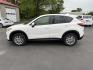 2014 White /Black Mazda CX-5 Touring AWD (JM3KE4CY7E0) with an 2.5L I4 DOHC 16V engine, 6-Speed Automatic transmission, located at 547 E. Main St., Orwell, OH, 44076, (440) 437-5893, 41.535435, -80.847855 - This 2014 Mazda CX-5 Touring features a 2.5L inline-4 engine paired with a 6-speed automatic transmission, offering a balanced blend of performance and efficiency with an estimated 29 MPG on the highway. It comes well-equipped for its class, including a 6.5-inch touchscreen, backup camera, blind spo - Photo#12