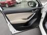 2014 White /Black Mazda CX-5 Touring AWD (JM3KE4CY7E0) with an 2.5L I4 DOHC 16V engine, 6-Speed Automatic transmission, located at 547 E. Main St., Orwell, OH, 44076, (440) 437-5893, 41.535435, -80.847855 - This 2014 Mazda CX-5 Touring features a 2.5L inline-4 engine paired with a 6-speed automatic transmission, offering a balanced blend of performance and efficiency with an estimated 29 MPG on the highway. It comes well-equipped for its class, including a 6.5-inch touchscreen, backup camera, blind spo - Photo#16