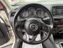 2014 White /Black Mazda CX-5 Touring AWD (JM3KE4CY7E0) with an 2.5L I4 DOHC 16V engine, 6-Speed Automatic transmission, located at 547 E. Main St., Orwell, OH, 44076, (440) 437-5893, 41.535435, -80.847855 - This 2014 Mazda CX-5 Touring features a 2.5L inline-4 engine paired with a 6-speed automatic transmission, offering a balanced blend of performance and efficiency with an estimated 29 MPG on the highway. It comes well-equipped for its class, including a 6.5-inch touchscreen, backup camera, blind spo - Photo#22