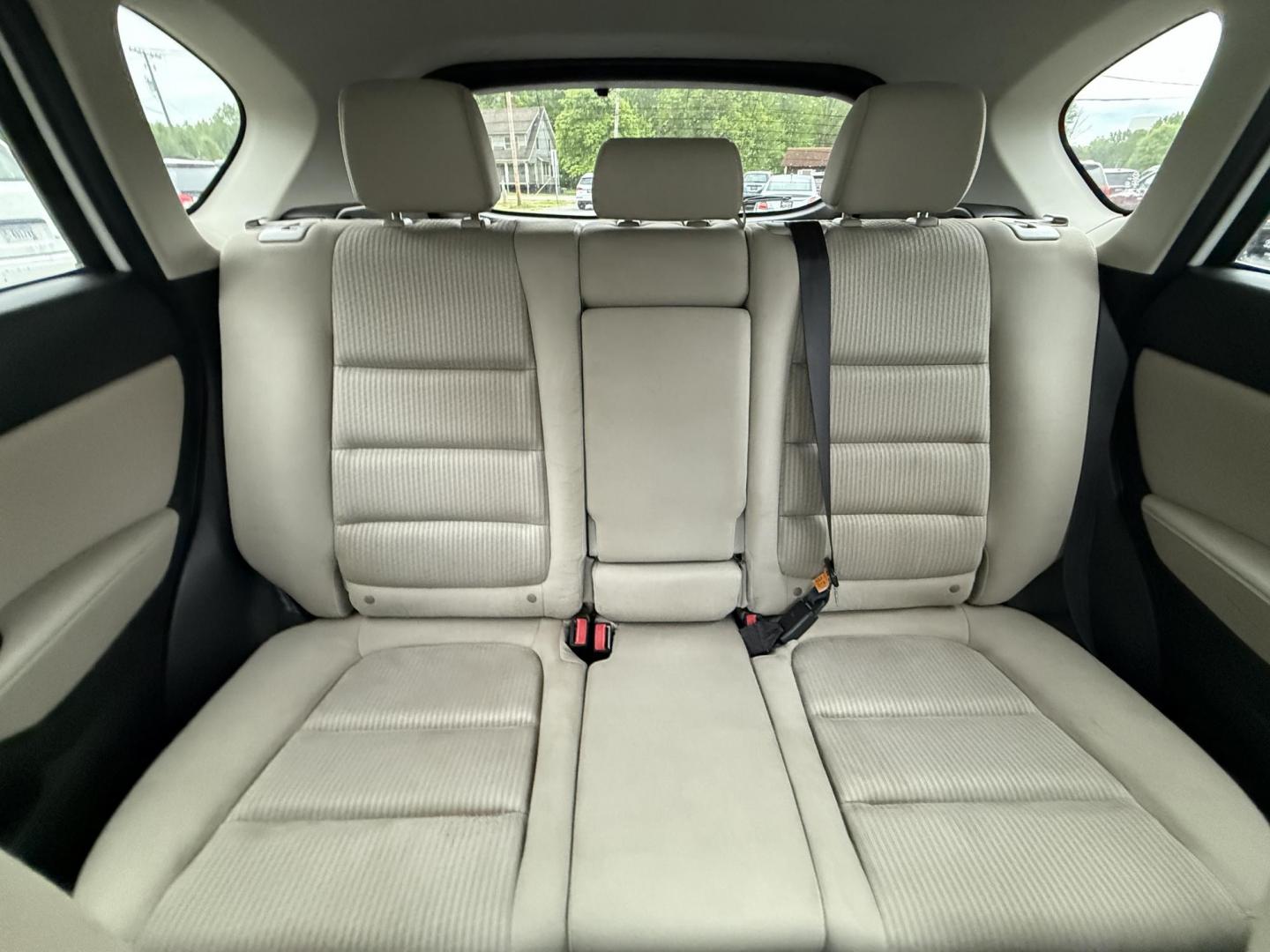 2014 White /Black Mazda CX-5 Touring AWD (JM3KE4CY7E0) with an 2.5L I4 DOHC 16V engine, 6-Speed Automatic transmission, located at 547 E. Main St., Orwell, OH, 44076, (440) 437-5893, 41.535435, -80.847855 - This 2014 Mazda CX-5 Touring features a 2.5L inline-4 engine paired with a 6-speed automatic transmission, offering a balanced blend of performance and efficiency with an estimated 29 MPG on the highway. It comes well-equipped for its class, including a 6.5-inch touchscreen, backup camera, blind spo - Photo#27