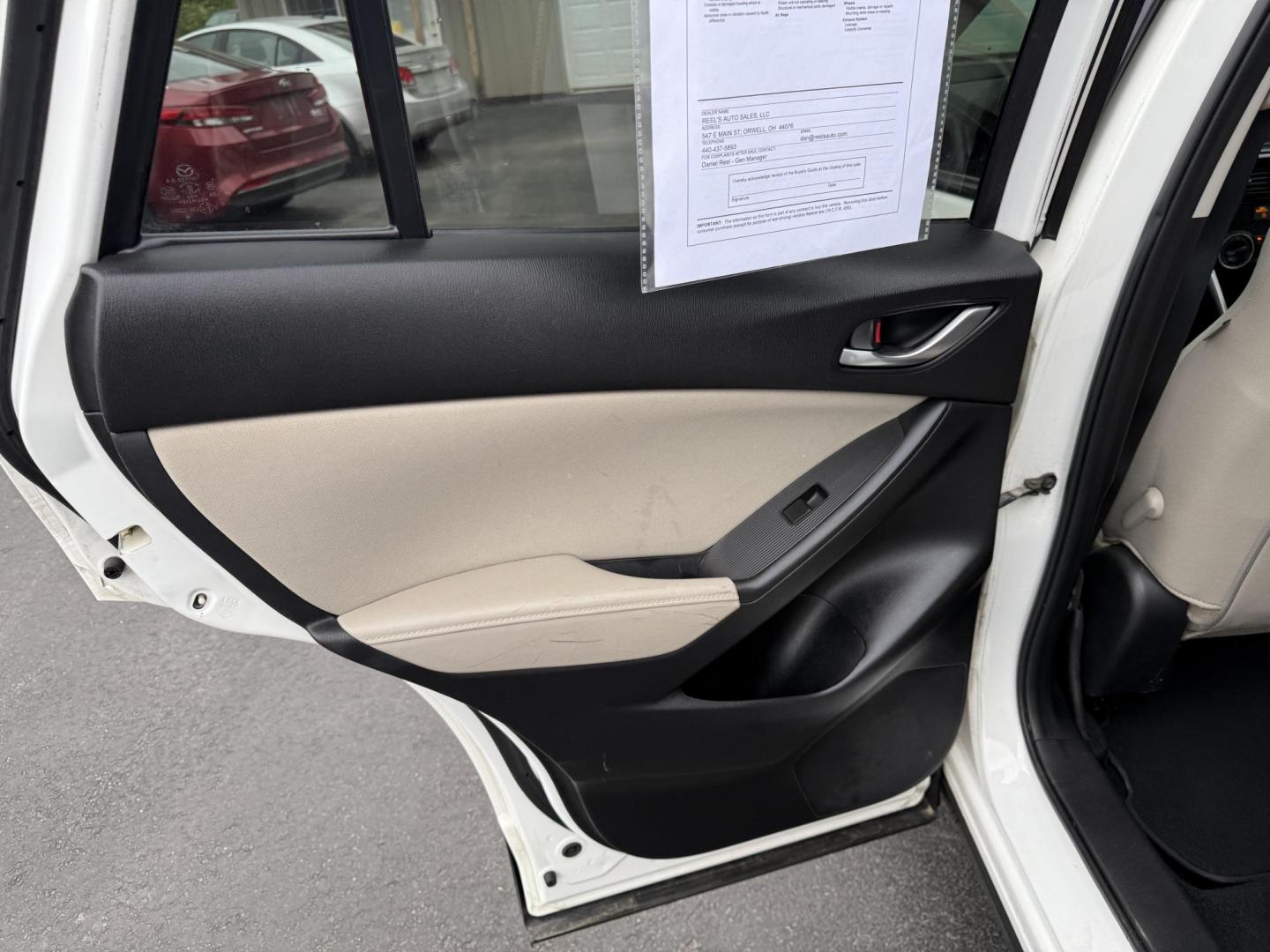 2014 White /Black Mazda CX-5 Touring AWD (JM3KE4CY7E0) with an 2.5L I4 DOHC 16V engine, 6-Speed Automatic transmission, located at 547 E. Main St., Orwell, OH, 44076, (440) 437-5893, 41.535435, -80.847855 - This 2014 Mazda CX-5 Touring features a 2.5L inline-4 engine paired with a 6-speed automatic transmission, offering a balanced blend of performance and efficiency with an estimated 29 MPG on the highway. It comes well-equipped for its class, including a 6.5-inch touchscreen, backup camera, blind spo - Photo#29