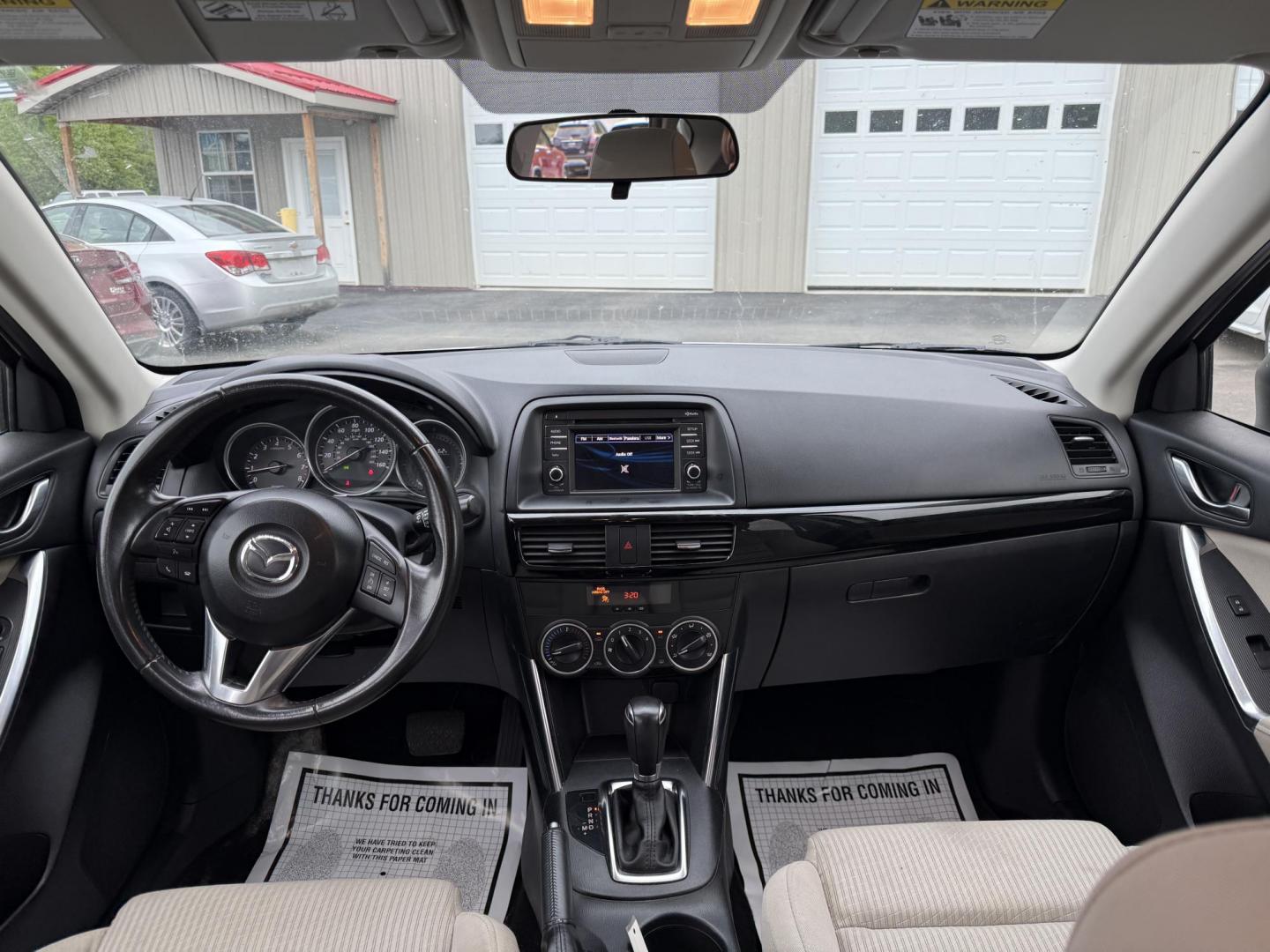 2014 White /Black Mazda CX-5 Touring AWD (JM3KE4CY7E0) with an 2.5L I4 DOHC 16V engine, 6-Speed Automatic transmission, located at 547 E. Main St., Orwell, OH, 44076, (440) 437-5893, 41.535435, -80.847855 - This 2014 Mazda CX-5 Touring features a 2.5L inline-4 engine paired with a 6-speed automatic transmission, offering a balanced blend of performance and efficiency with an estimated 29 MPG on the highway. It comes well-equipped for its class, including a 6.5-inch touchscreen, backup camera, blind spo - Photo#30