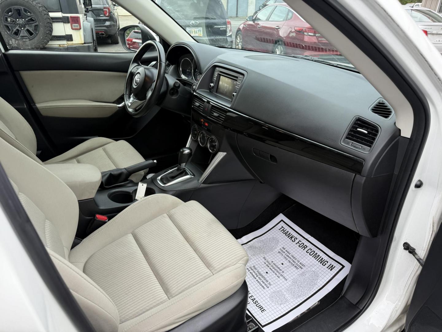2014 White /Black Mazda CX-5 Touring AWD (JM3KE4CY7E0) with an 2.5L I4 DOHC 16V engine, 6-Speed Automatic transmission, located at 547 E. Main St., Orwell, OH, 44076, (440) 437-5893, 41.535435, -80.847855 - This 2014 Mazda CX-5 Touring features a 2.5L inline-4 engine paired with a 6-speed automatic transmission, offering a balanced blend of performance and efficiency with an estimated 29 MPG on the highway. It comes well-equipped for its class, including a 6.5-inch touchscreen, backup camera, blind spo - Photo#35
