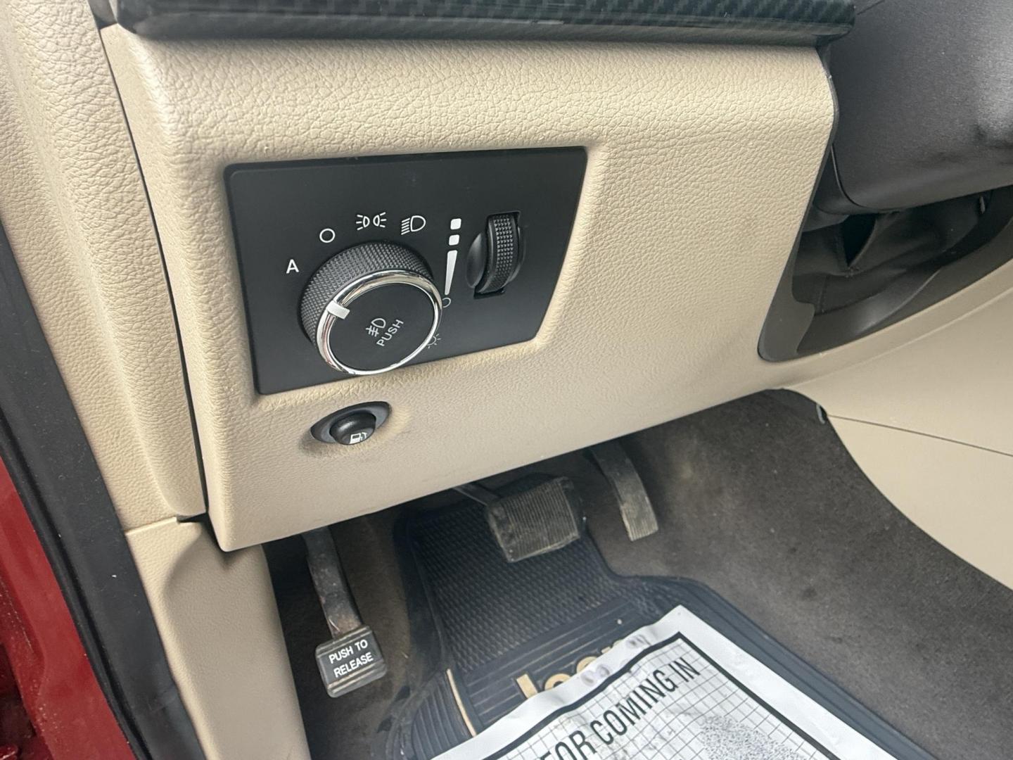2011 Red /Tan Jeep Grand Cherokee Overland 4WD (1J4RR6GT8BC) with an 5.7L V8 OHV 16V engine, 5-Speed Automatic transmission, located at 547 E. Main St., Orwell, OH, 44076, (440) 437-5893, 41.535435, -80.847855 - This 2011 Jeep Grand Cherokee Overland 4WD comes equipped with a powerful 5.7L HEMI V8 engine and a 5-speed automatic transmission, offering robust performance and a substantial 7,200-pound towing capacity. Its luxury-oriented interior features leather seating, heated and cooled front seats, a 6.5-i - Photo#14